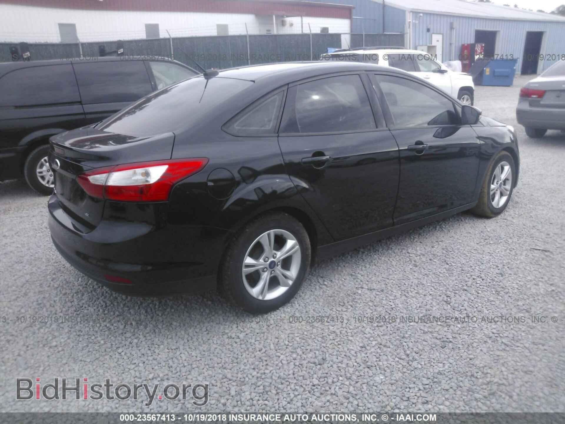 2014 Ford Focus - VIN: 1FADP3F29EL135724 - Фото 4