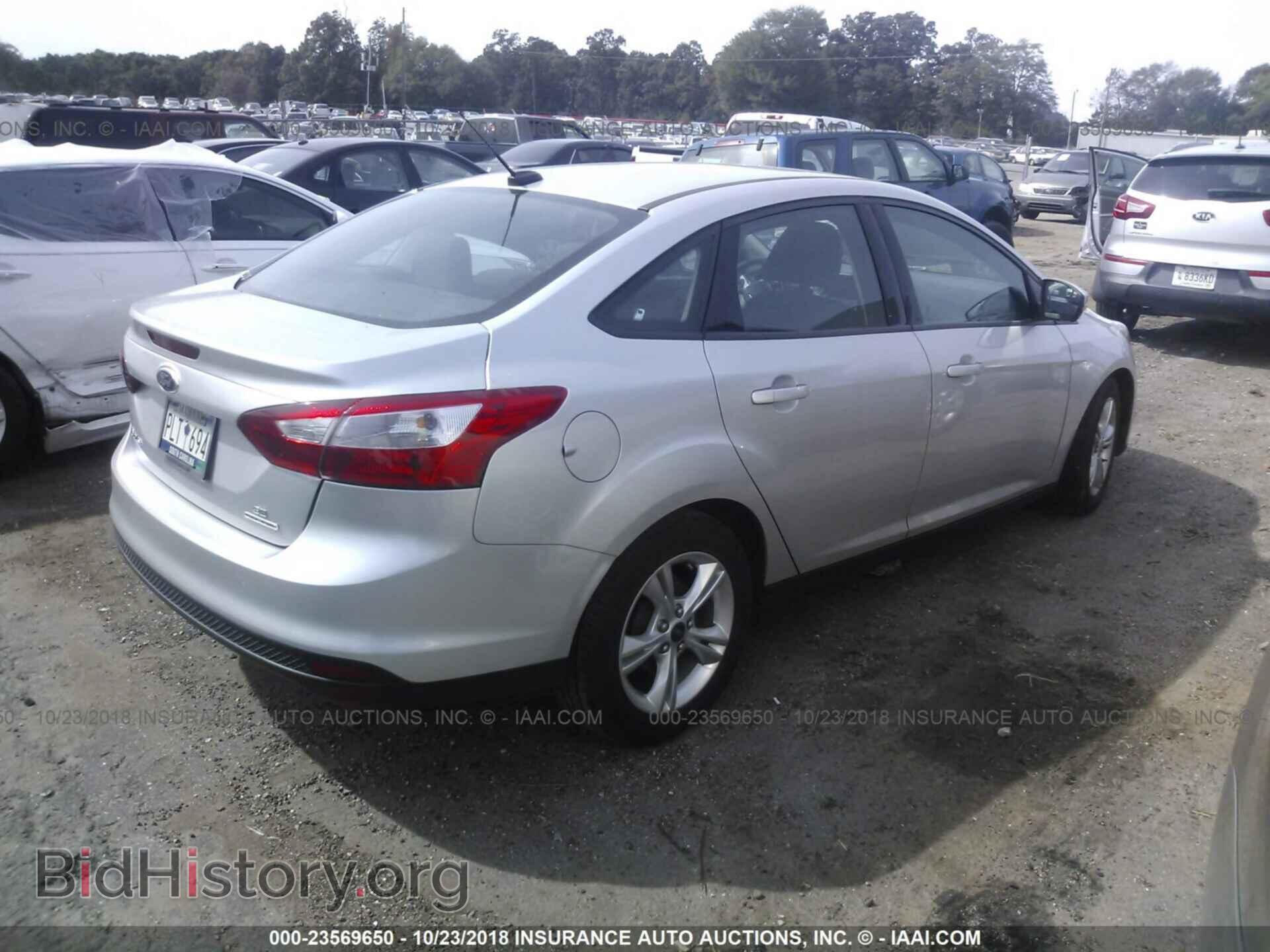 2014 Ford Focus - VIN: 1FADP3F23EL159534 - Фото 4