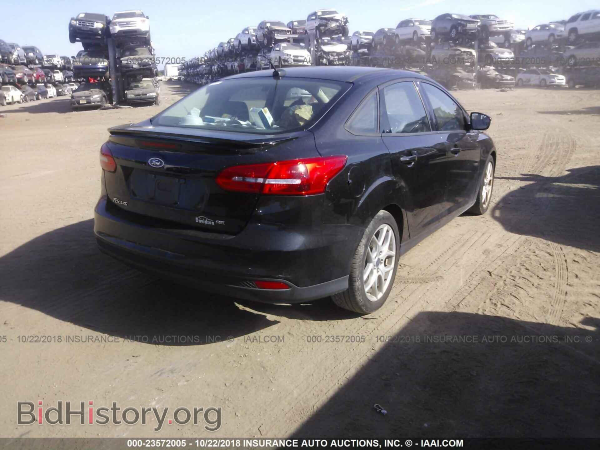 2015 Ford Focus - VIN: 1FADP3F23FL372114 - Photo 4