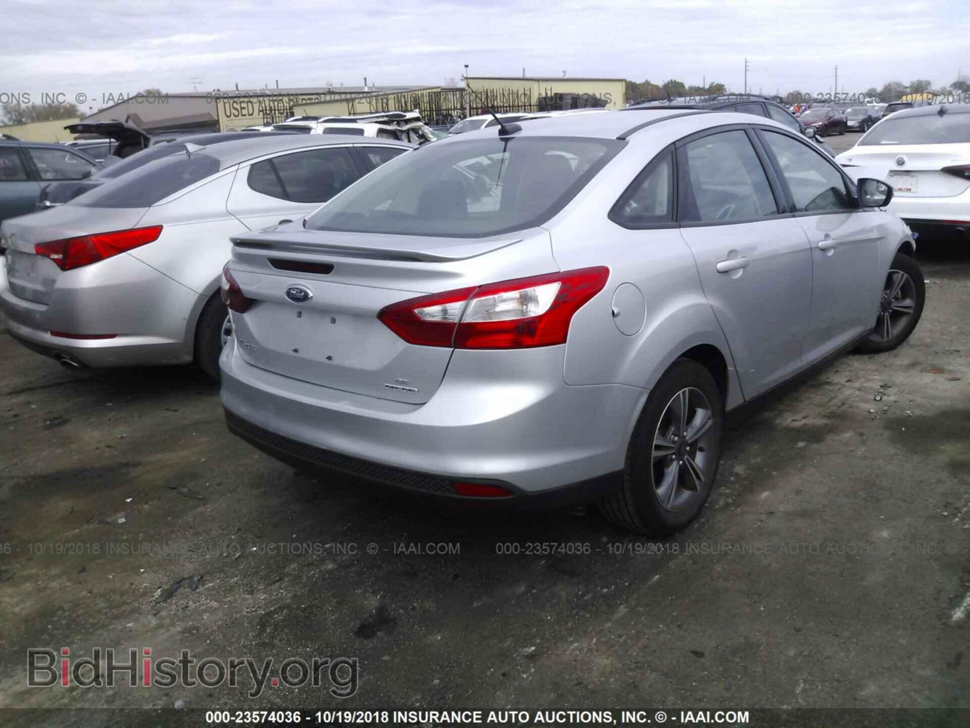 2014 Ford Focus - VIN: 1FADP3F27EL371787 - Фото 4