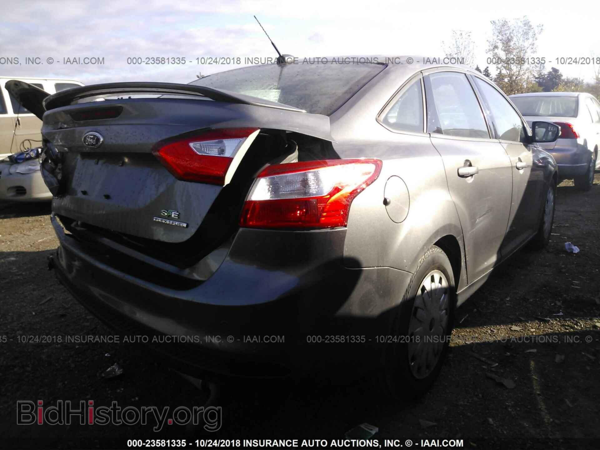2014 Ford Focus - VIN: 1FADP3F28EL306284 - Фото 4