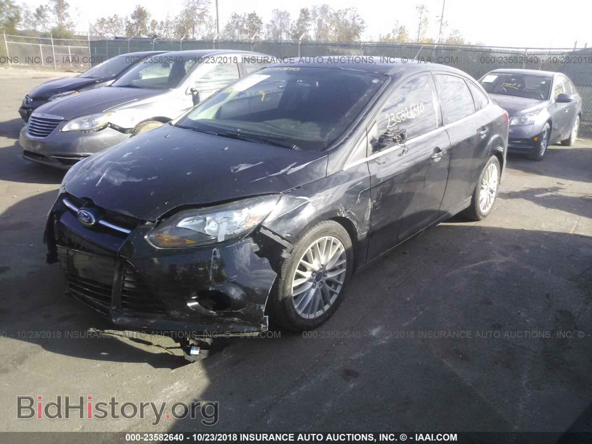 2014 Ford Focus - VIN: 1FADP3J20EL342378 - Фото 2