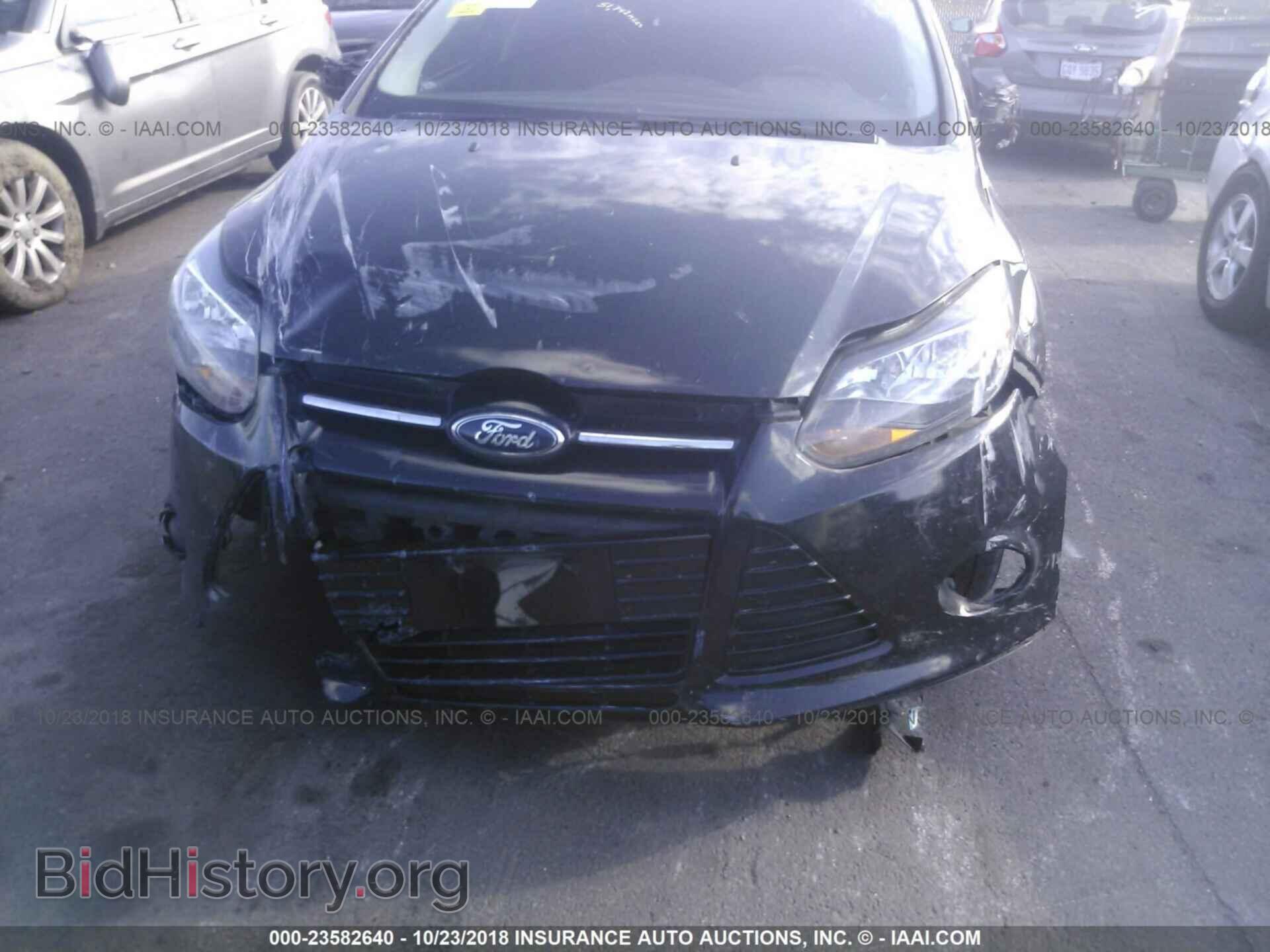 2014 Ford Focus - VIN: 1FADP3J20EL342378 - Фото 6