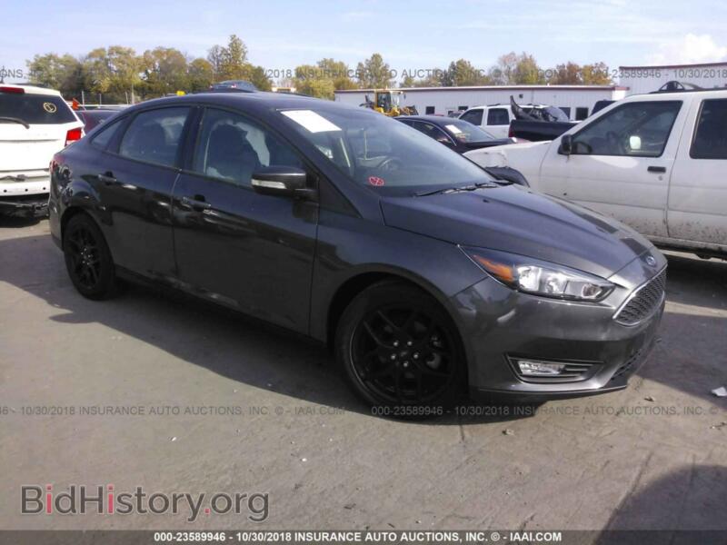 2016 Ford FOCUS (VIN 1FADP3F28GL311729) — фото 1 из 10, IAAI, повреждение: левый бок