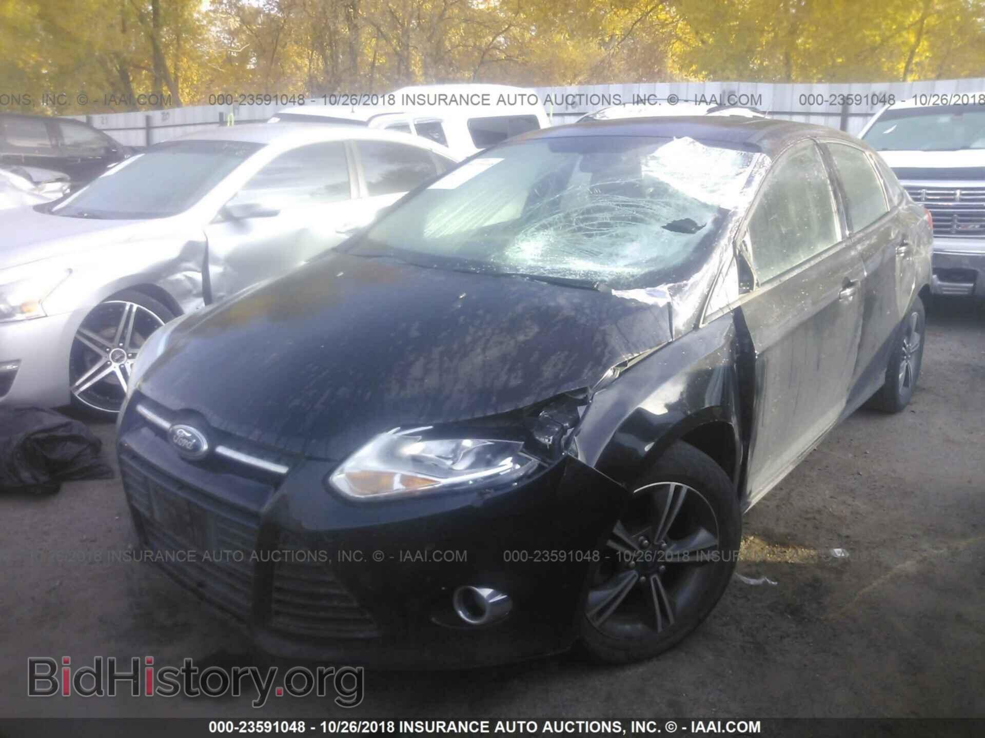 2014 Ford Focus - VIN: 1FADP3F2XEL452752 - Фото 2