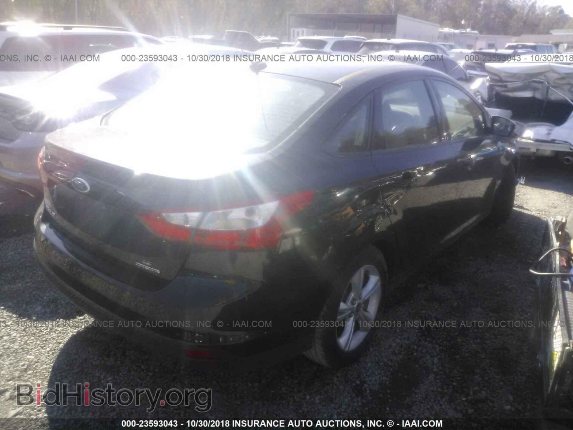 2014 Ford Focus - VIN: 1FADP3F20EL228020 - Фото 4