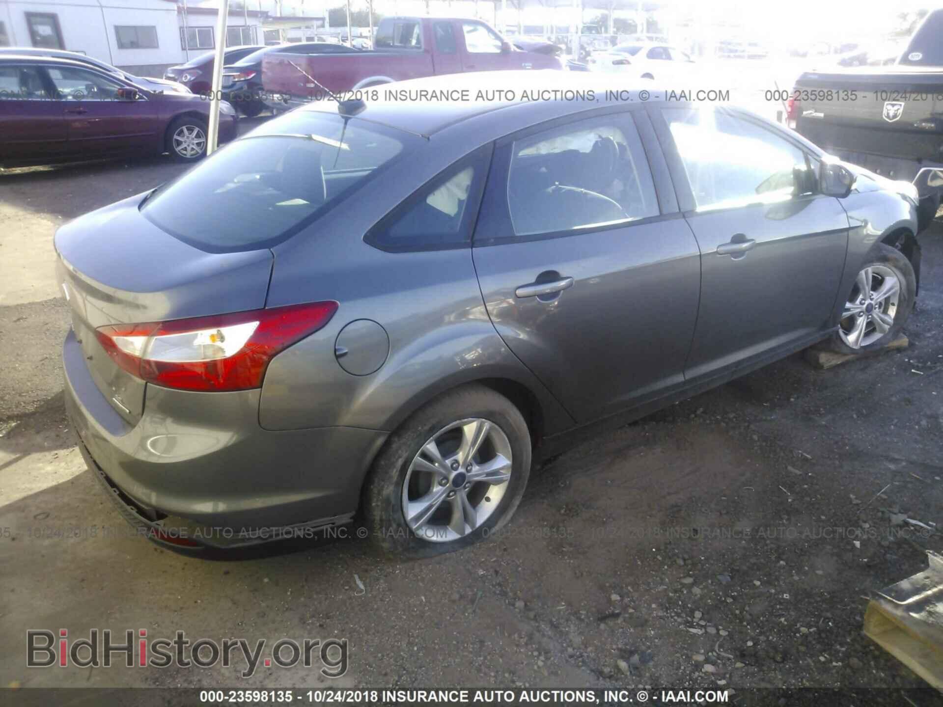 2014 Ford Focus - VIN: 1FADP3F21EL156678 - Photo 4