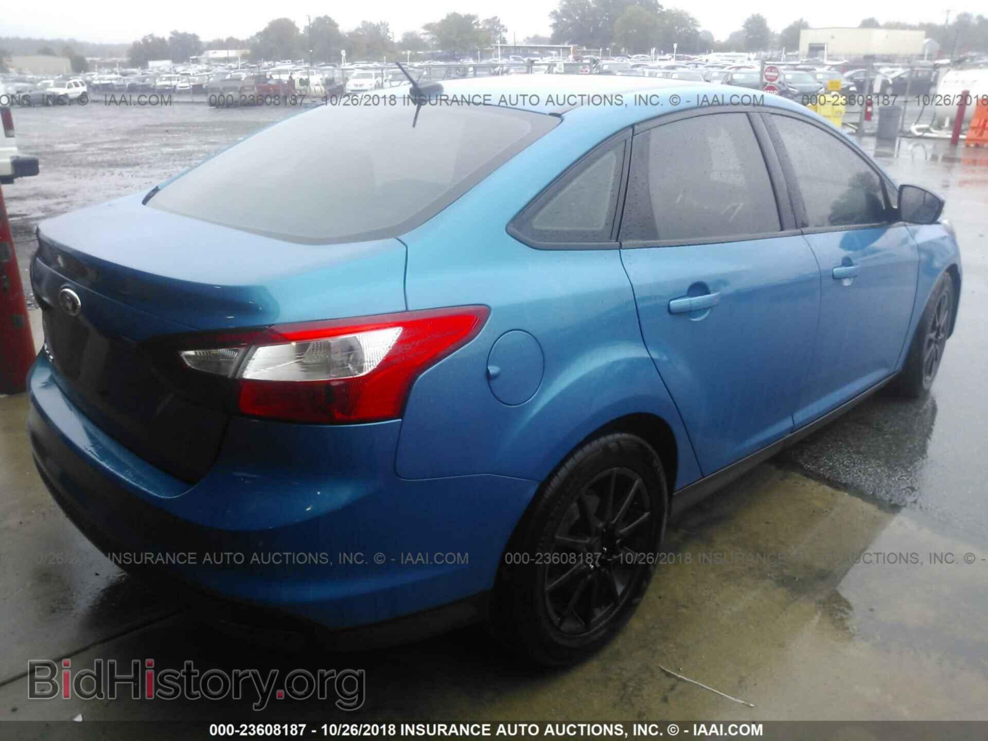 2014 Ford Focus - VIN: 1FADP3F21EL435807 - Фото 4