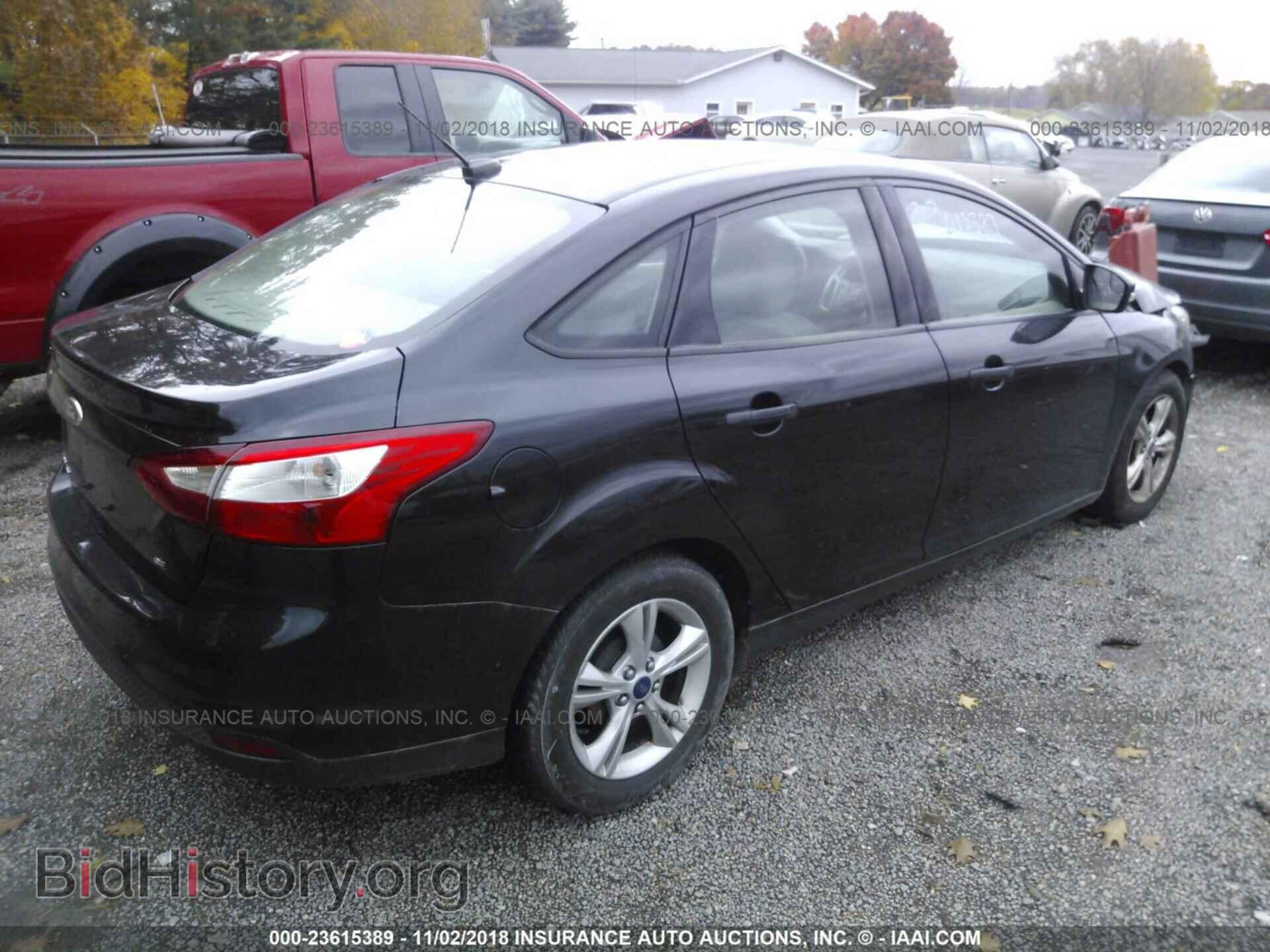 2014 Ford Focus - VIN: 1FADP3F29EL308626 - Photo 4