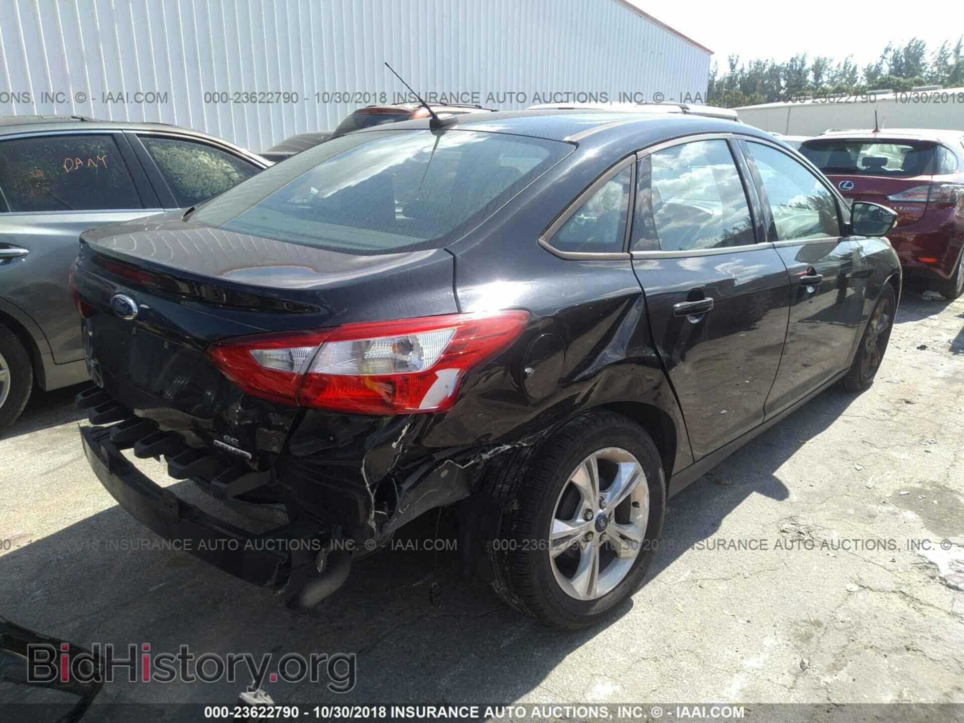 2013 Ford Focus - VIN: 1FADP3F24DL338230 - Фото 4