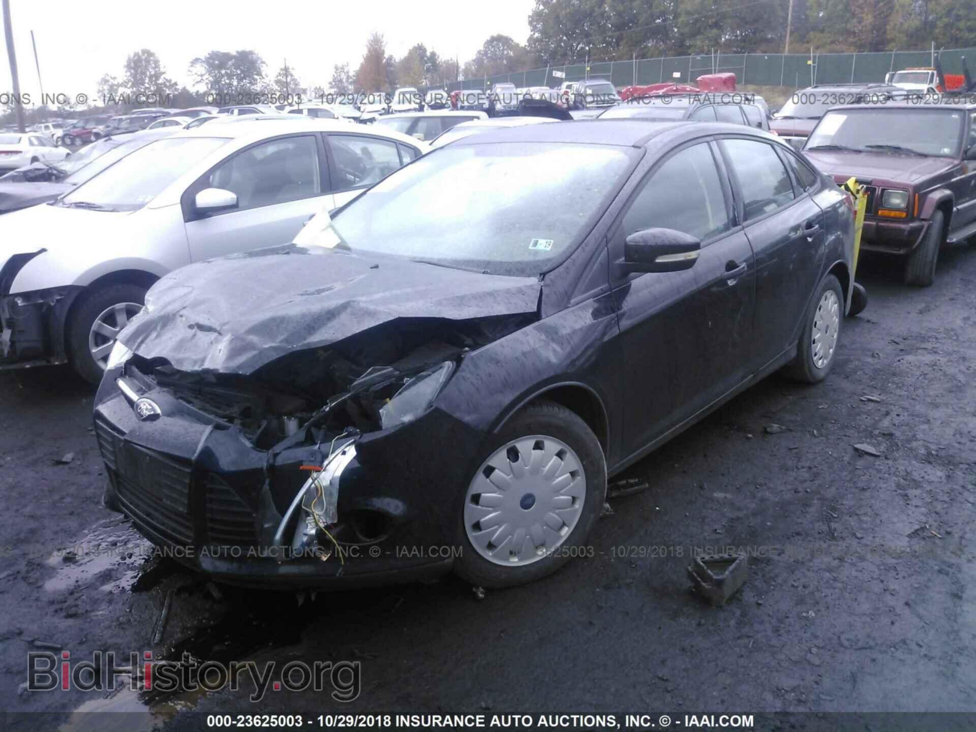 2013 Ford Focus - VIN: 1FADP3F2XDL180380 - Photo 2