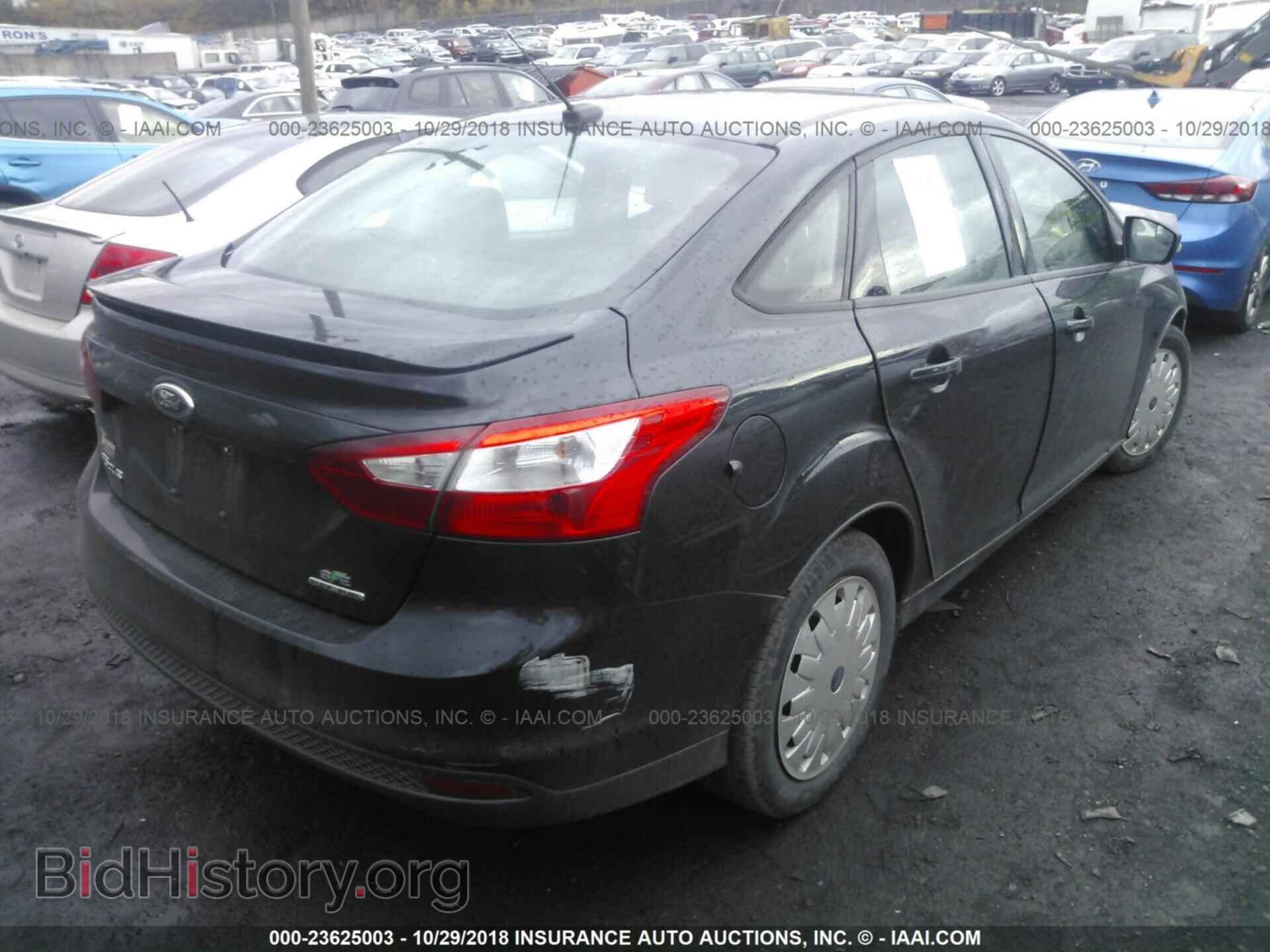2013 Ford Focus - VIN: 1FADP3F2XDL180380 - Photo 4