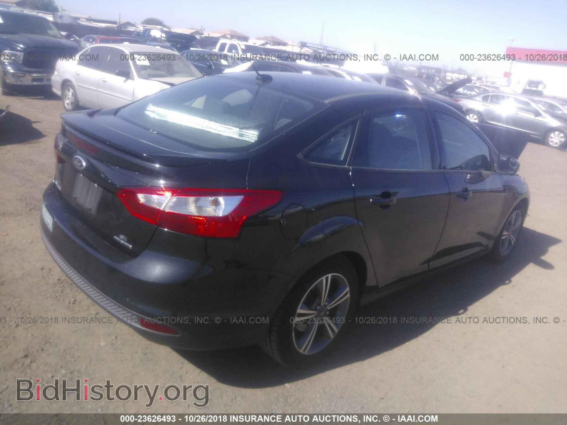 2014 Ford Focus - VIN: 1FADP3F24EL293968 - Фото 4