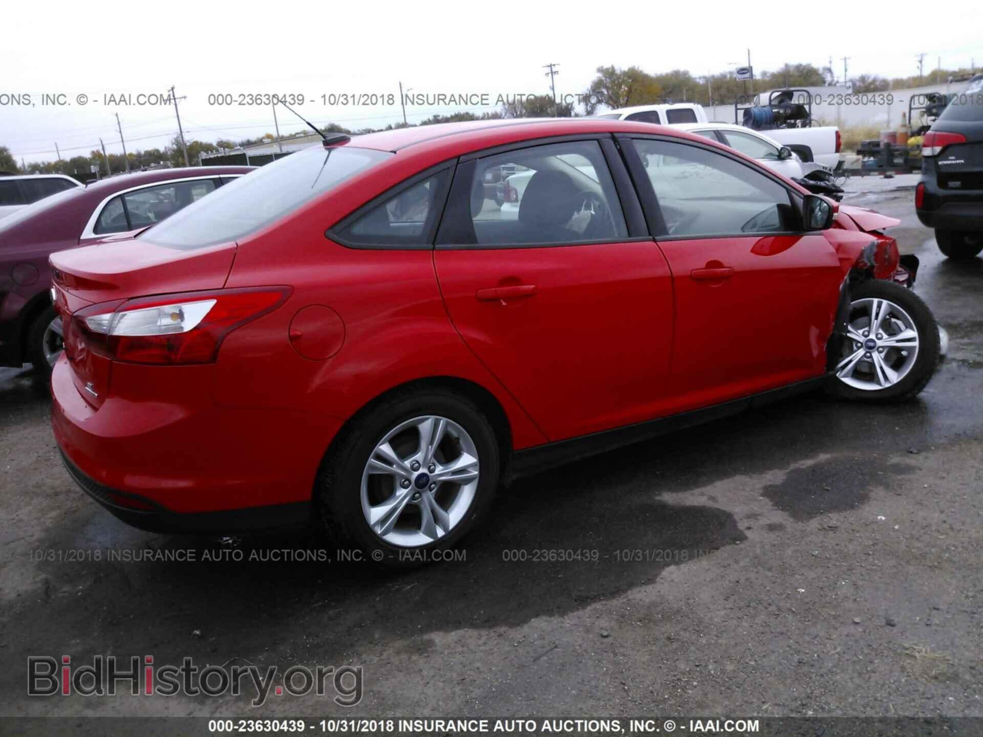2014 Ford Focus - VIN: 1FADP3F22EL381501 - Photo 4