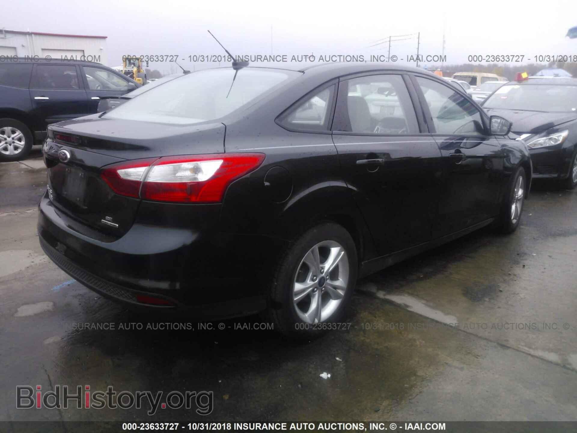 2014 Ford Focus - VIN: 1FADP3F26EL203364 - Photo 4