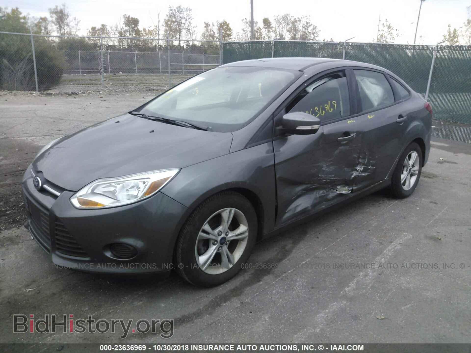 2014 Ford Focus - VIN: 1FADP3F22EL433239 - Фото 2