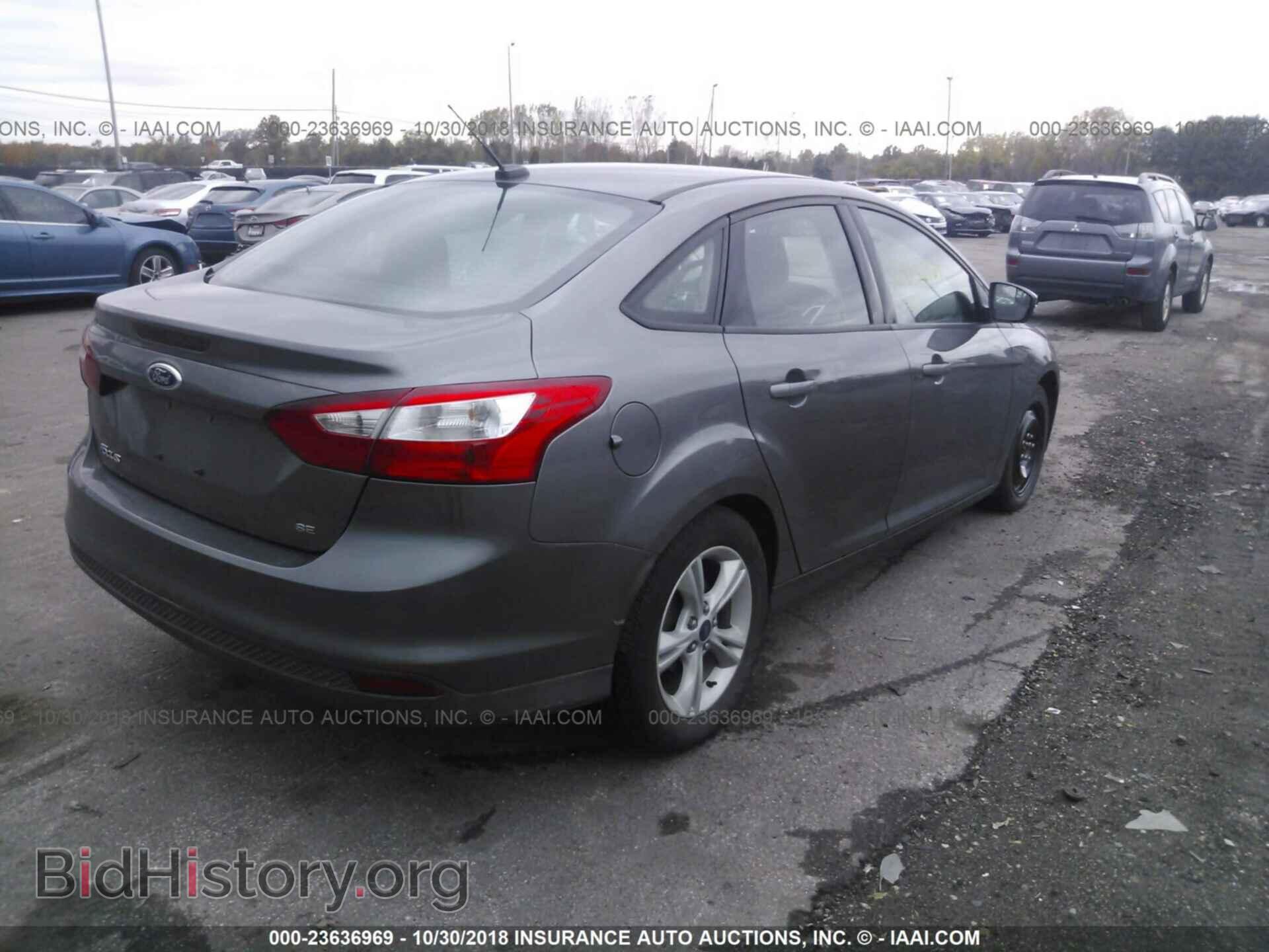 2014 Ford Focus - VIN: 1FADP3F22EL433239 - Фото 4