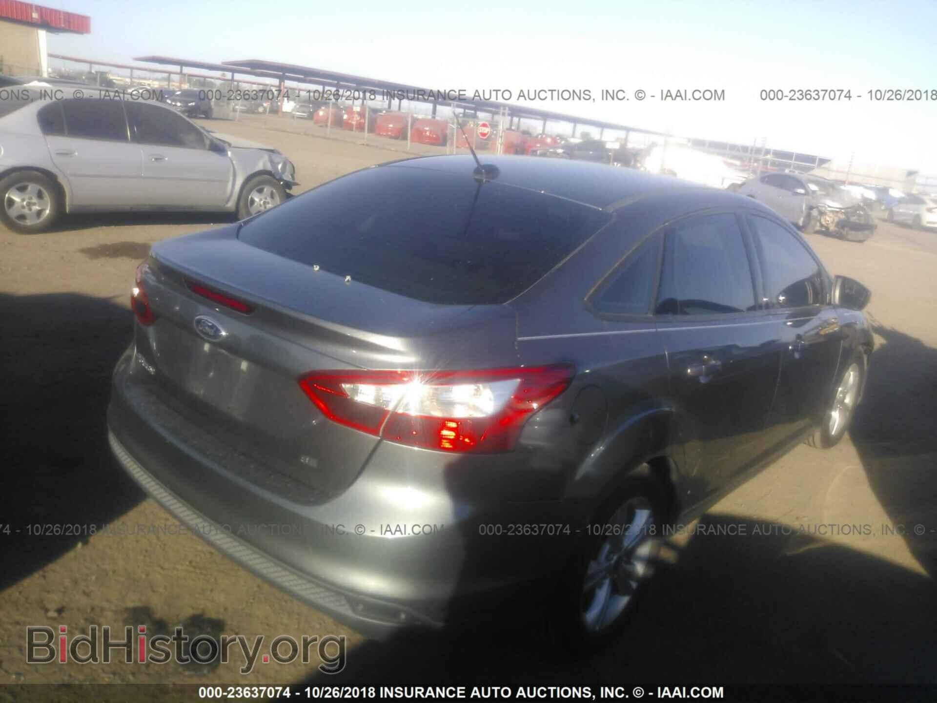 2014 Ford Focus - VIN: 1FADP3F20EL313178 - Photo 4