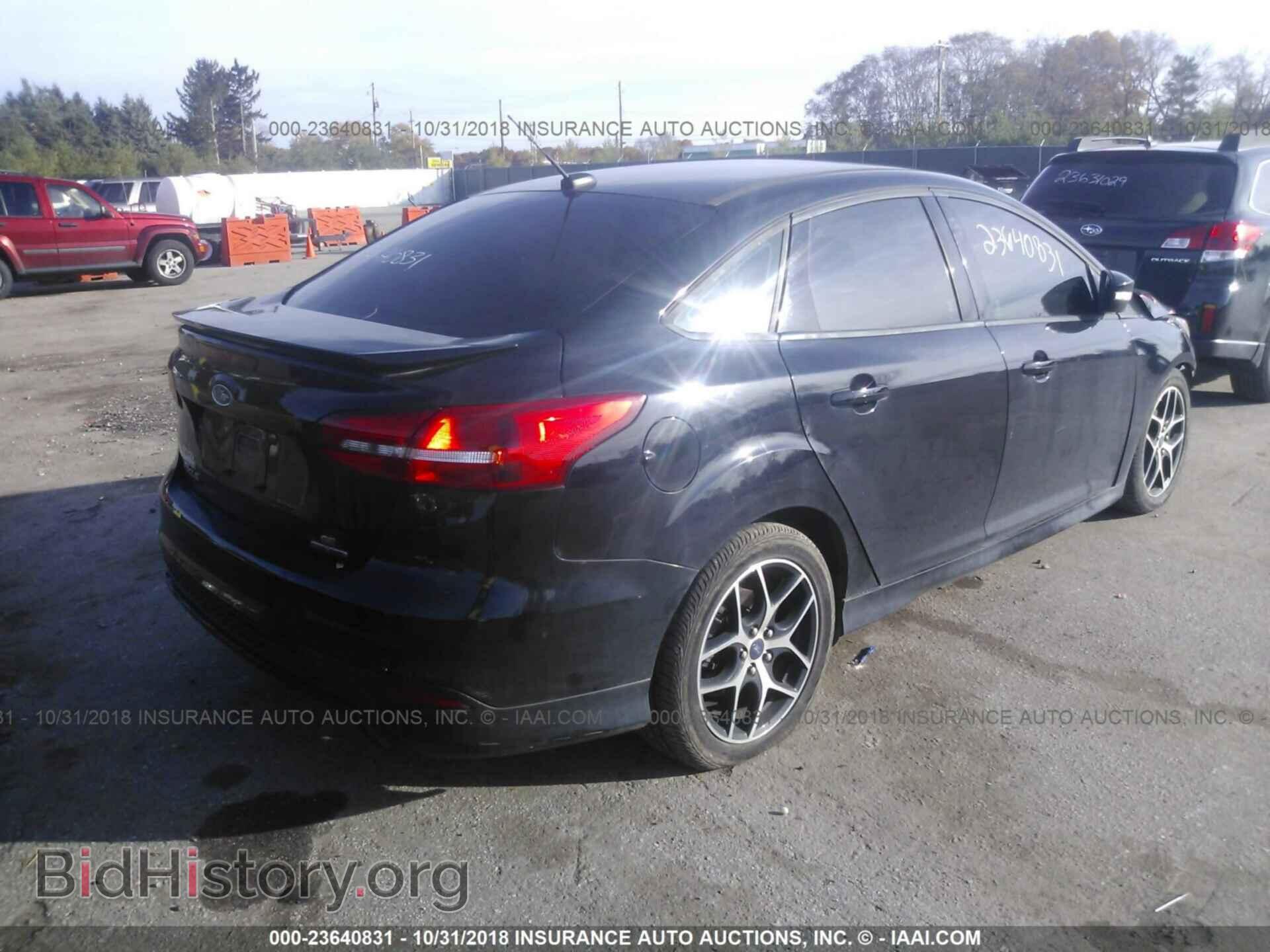 2016 FORD FOCUS - VIN: 1FADP3F23GL242920 - Photo 4
