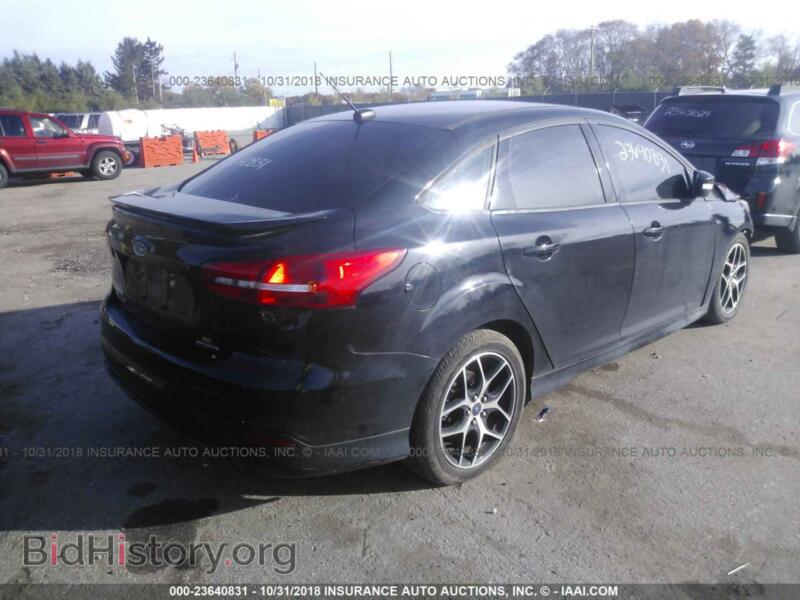 2016 Ford FOCUS (VIN 1FADP3F23GL242920) — фото 4 из 10