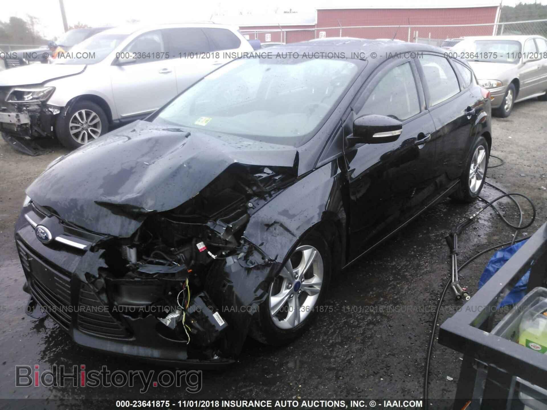 2014 Ford Focus - VIN: 1FADP3K27EL204657 - Фото 2