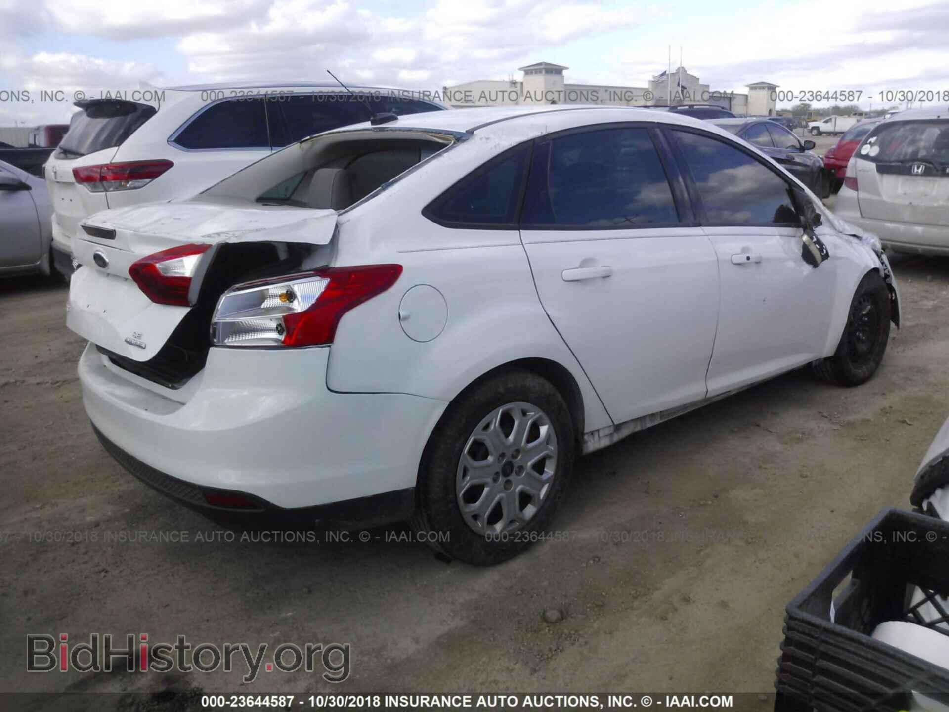2014 Ford Focus - VIN: 1FADP3F28EL103346 - Photo 4