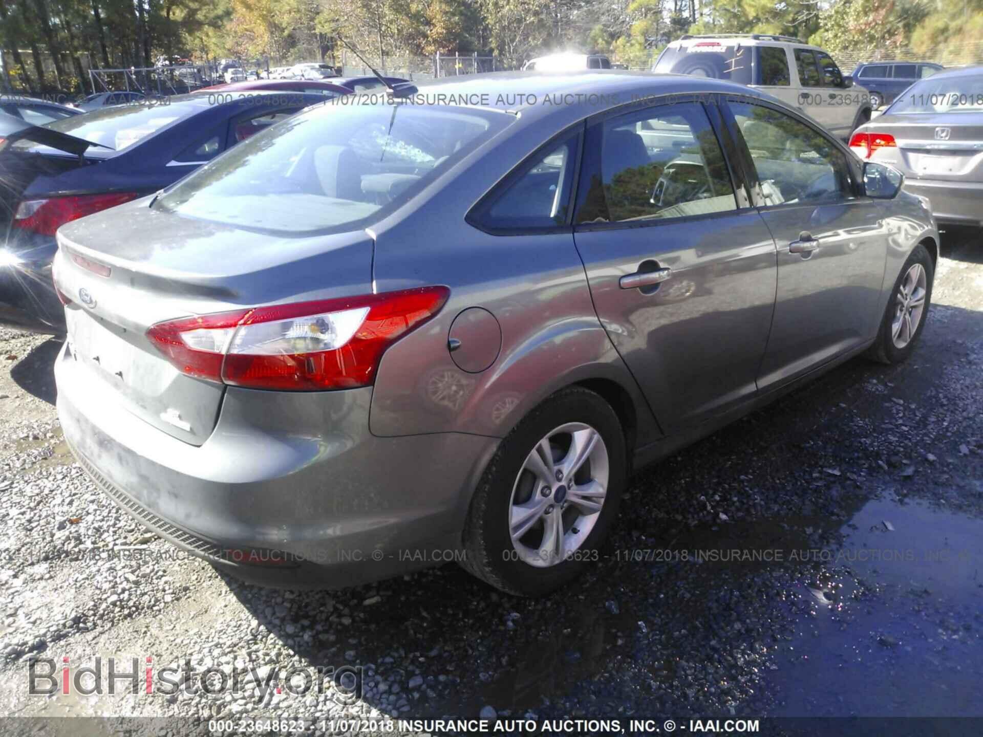 2014 Ford Focus - VIN: 1FADP3F25EL191966 - Photo 4