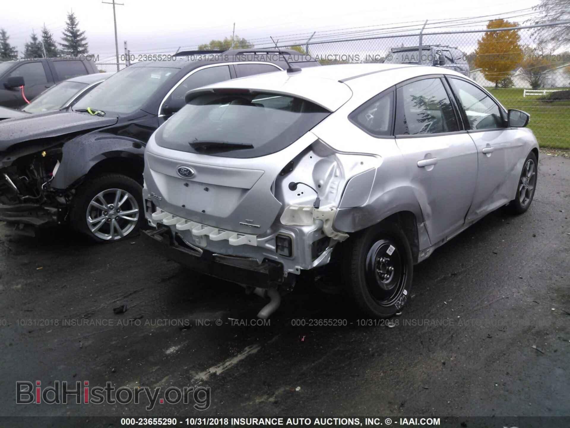 2014 Ford Focus - VIN: 1FADP3K29EL270062 - Photo 4