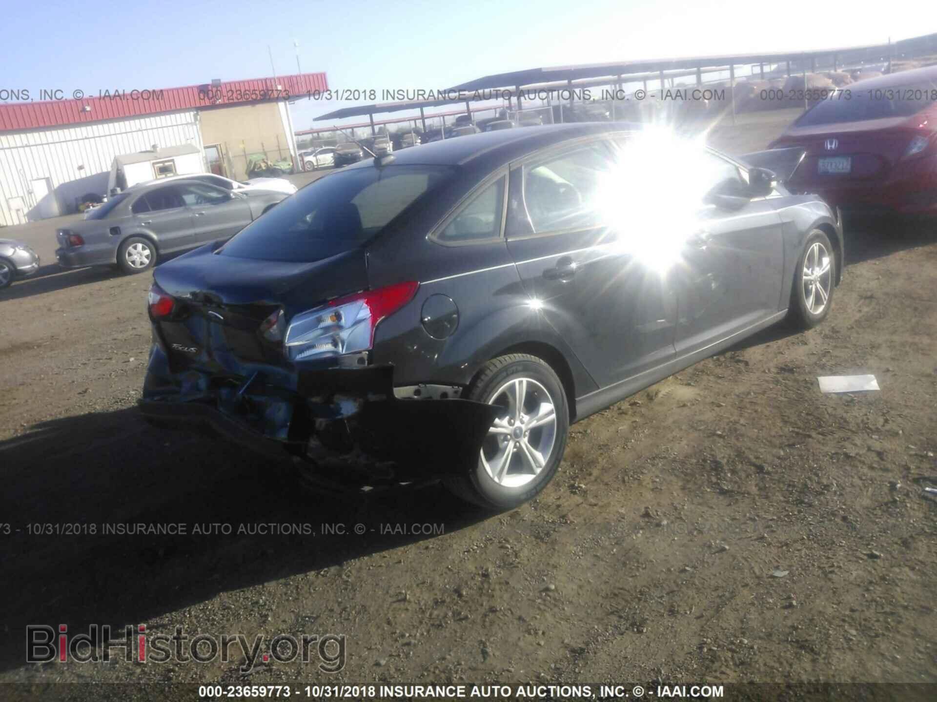 2013 Ford Focus - VIN: 1FADP3F2XDL196644 - Photo 4