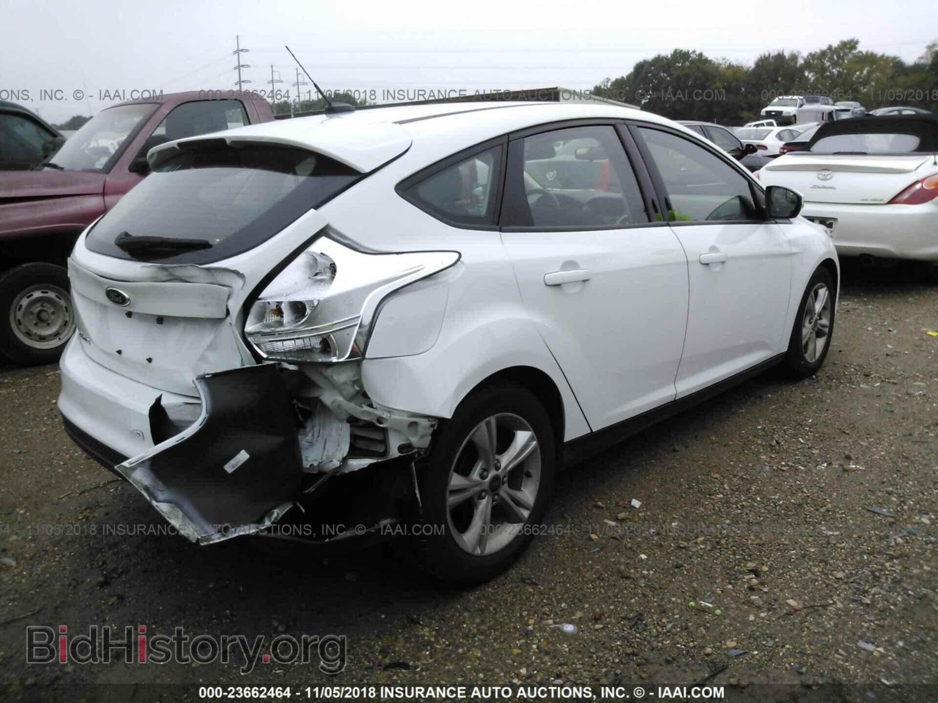2014 Ford Focus - VIN: 1FADP3K23EL447639 - Photo 4