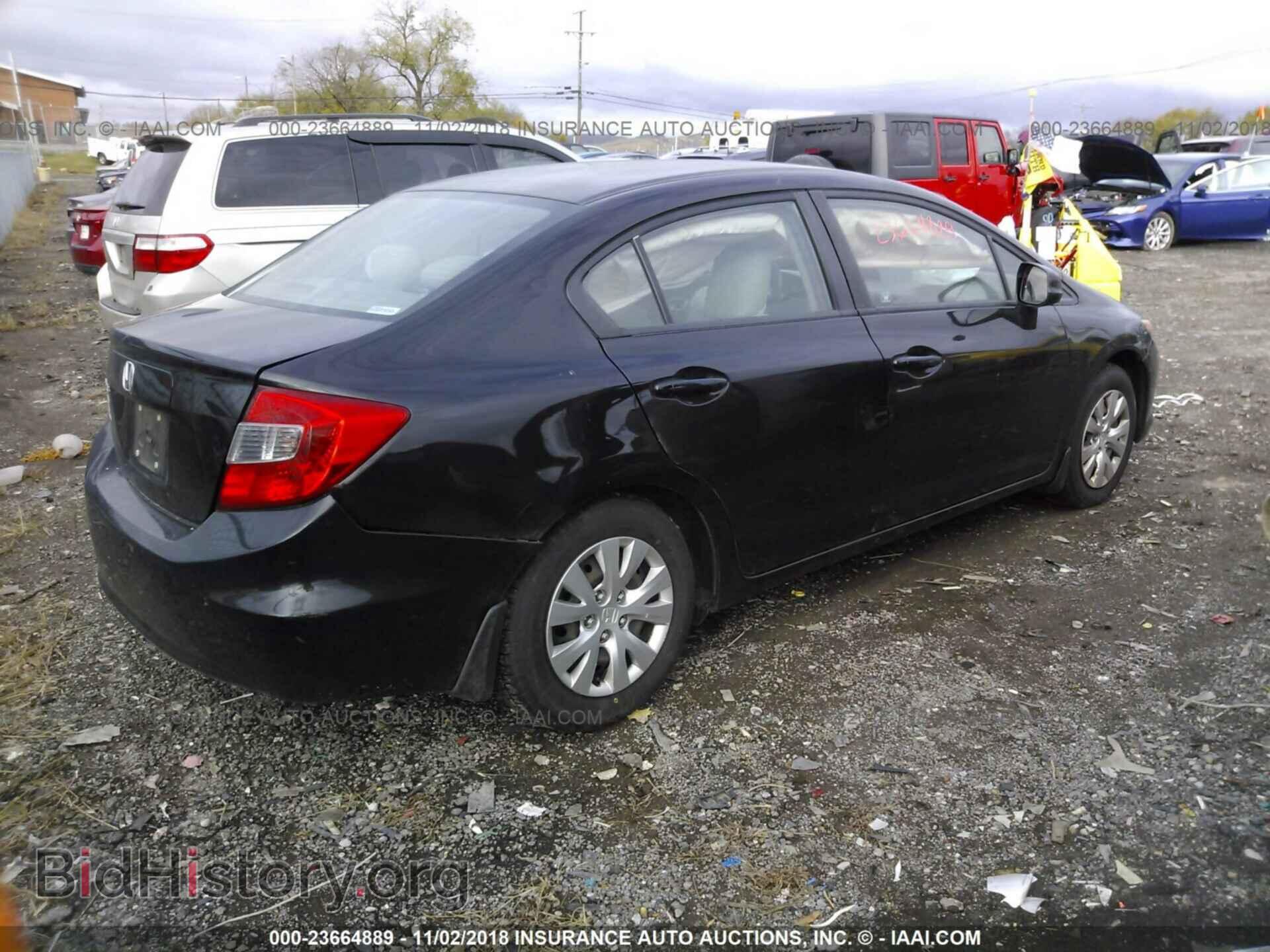 2012 Honda Civic - VIN: 19XFB2F5XCE085556 - Фото 4