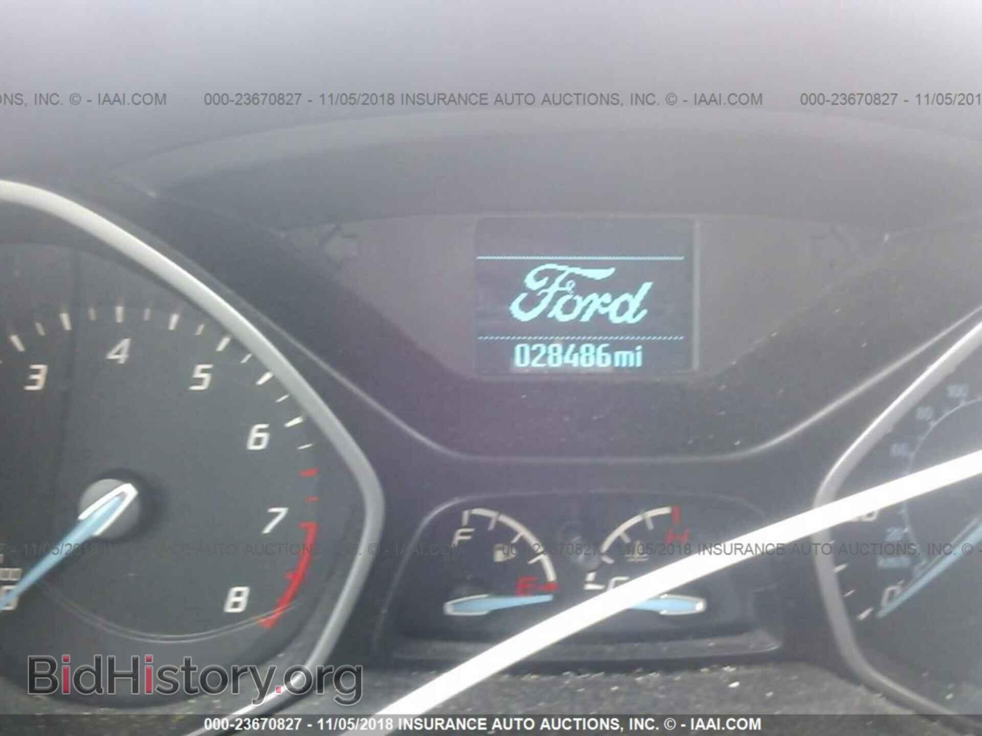 2014 Ford Focus - VIN: 1FADP3E21EL404753 - Photo 7