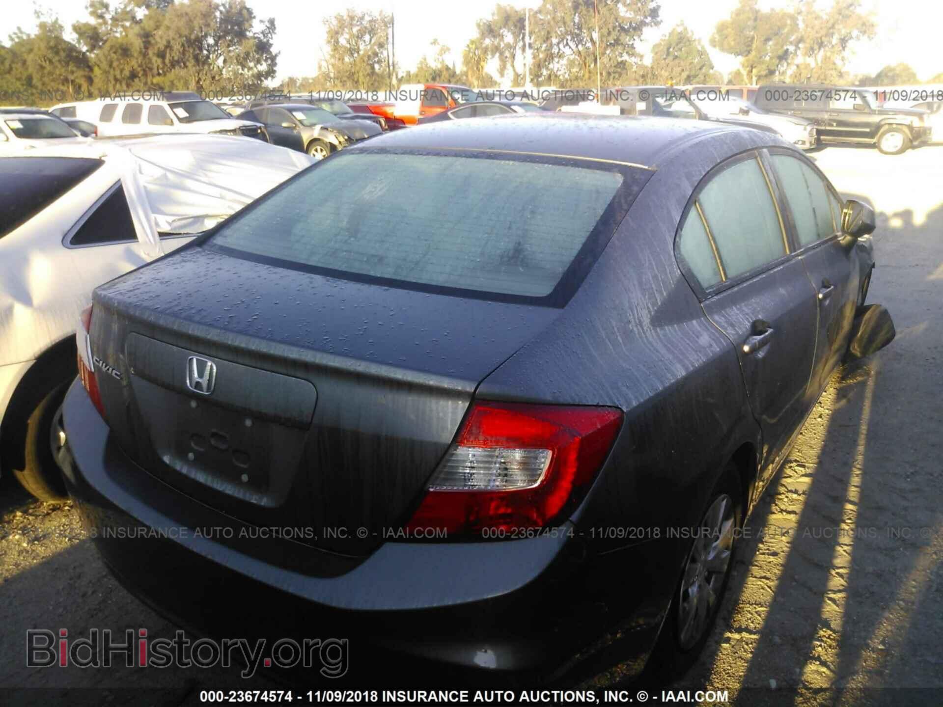 2012 Honda Civic - VIN: 19XFB2F55CE374604 - Фото 4