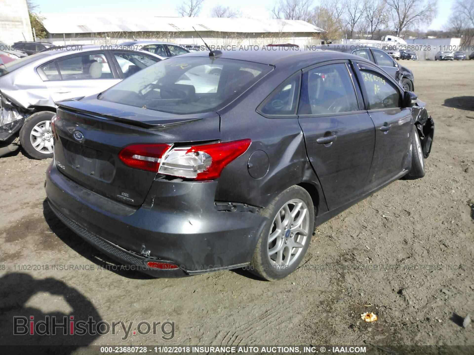 2015 FORD FOCUS - VIN: 1FADP3F21FL220638 - Photo 4