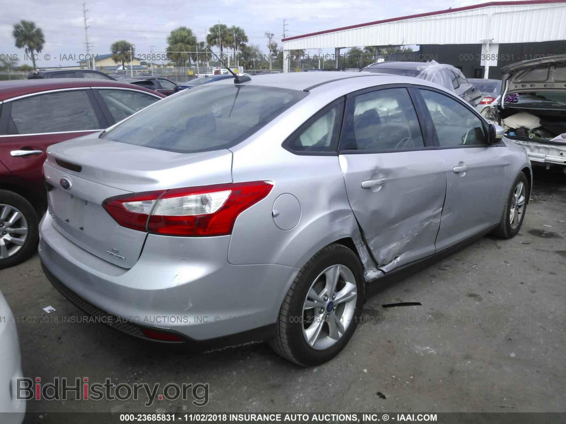 2013 Ford Focus - VIN: 1FADP3F2XDL286179 - Фото 4