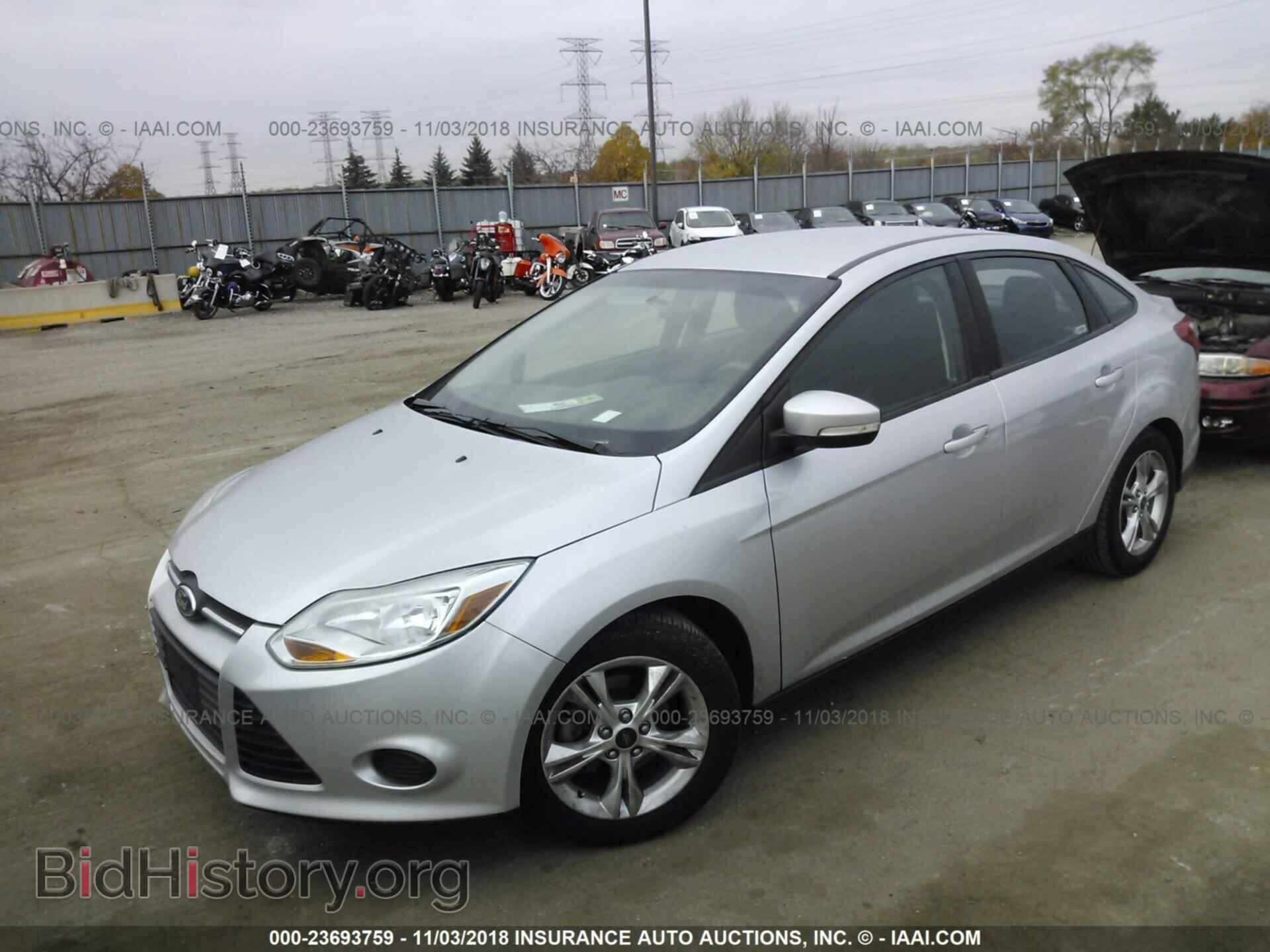 2014 Ford Focus - VIN: 1FADP3F26EL153811 - Фото 2