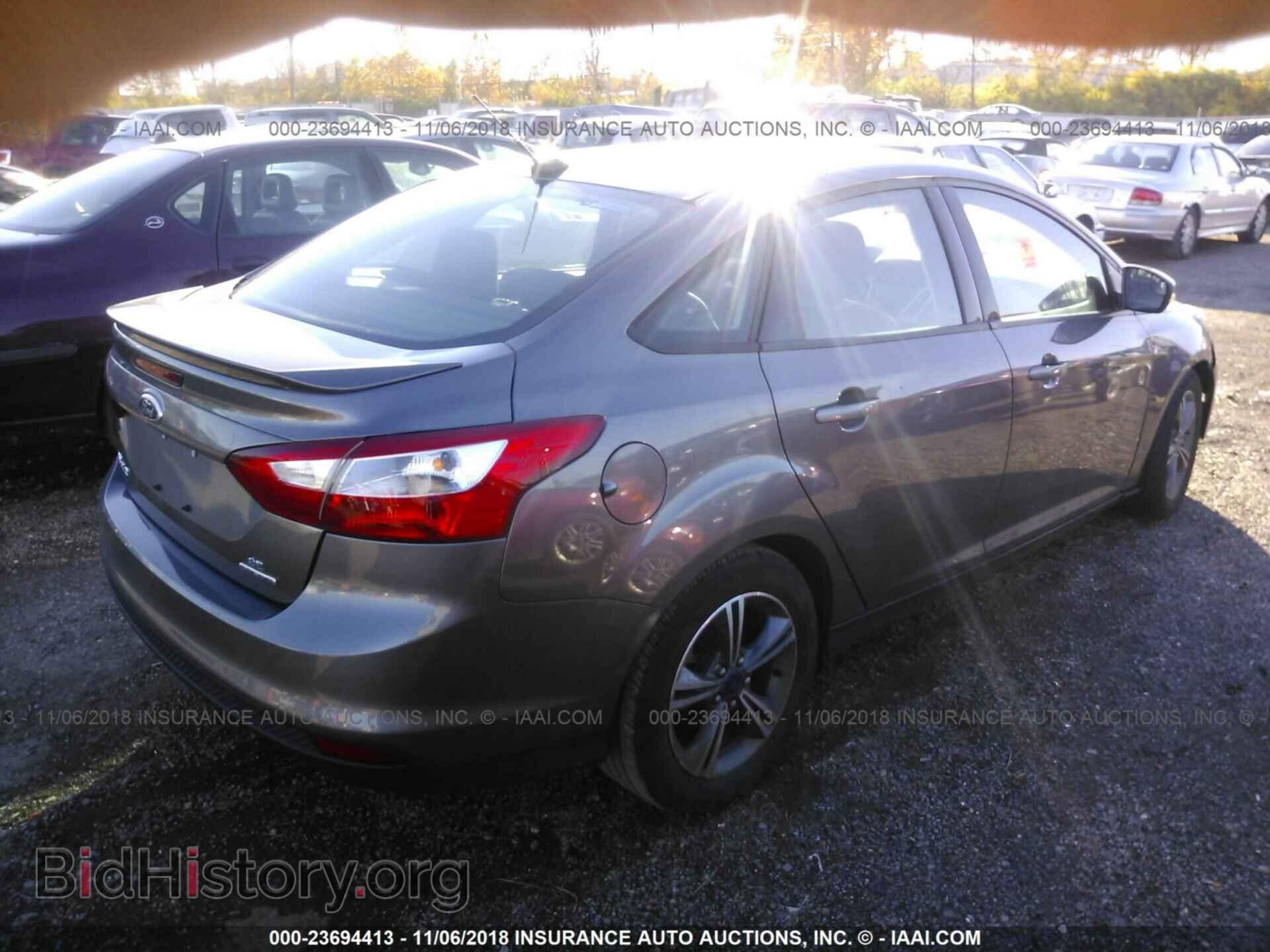 2014 Ford Focus - VIN: 1FADP3F27EL459254 - Photo 4