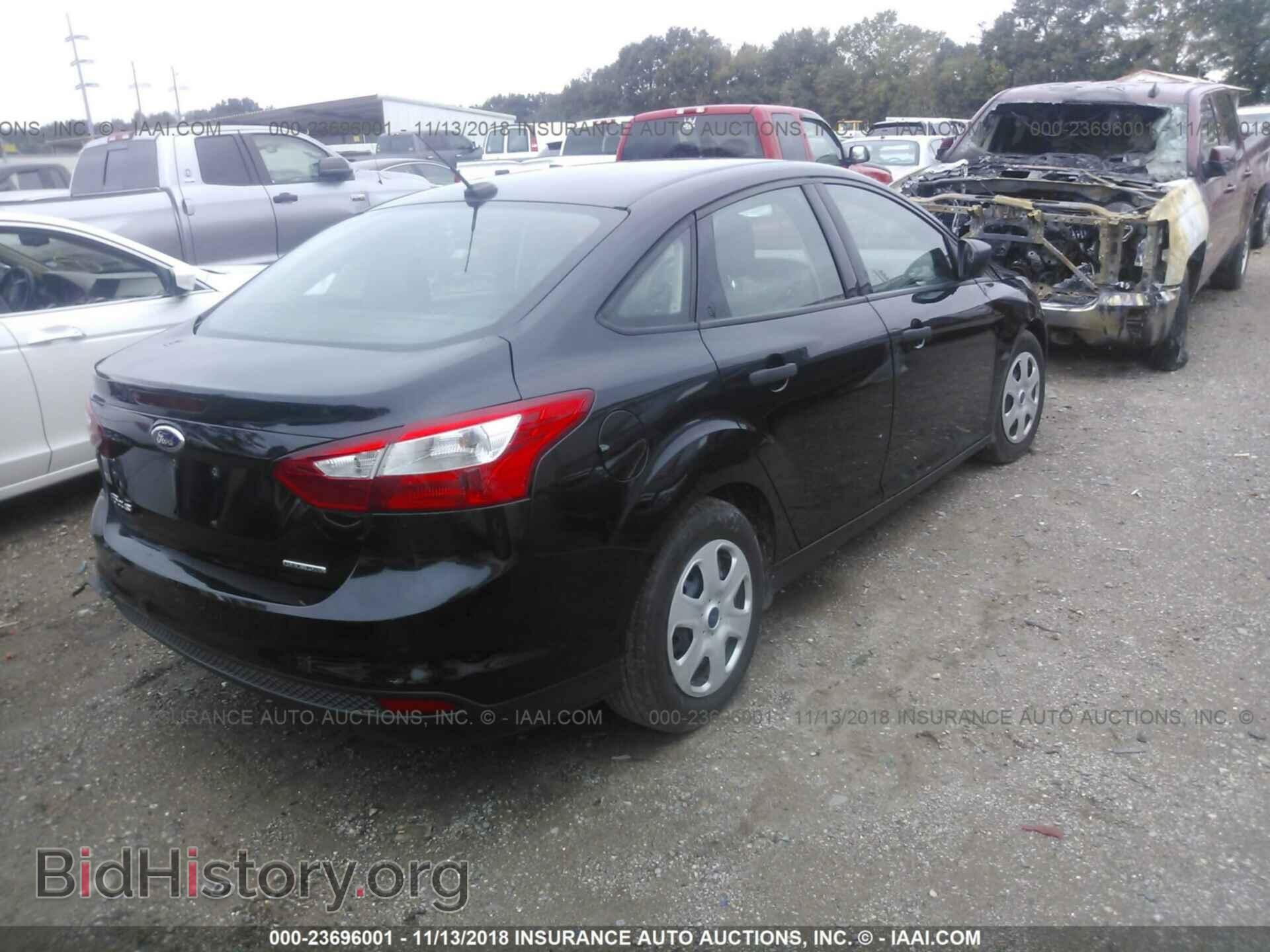 2014 Ford Focus - VIN: 1FADP3E24EL153047 - Photo 4