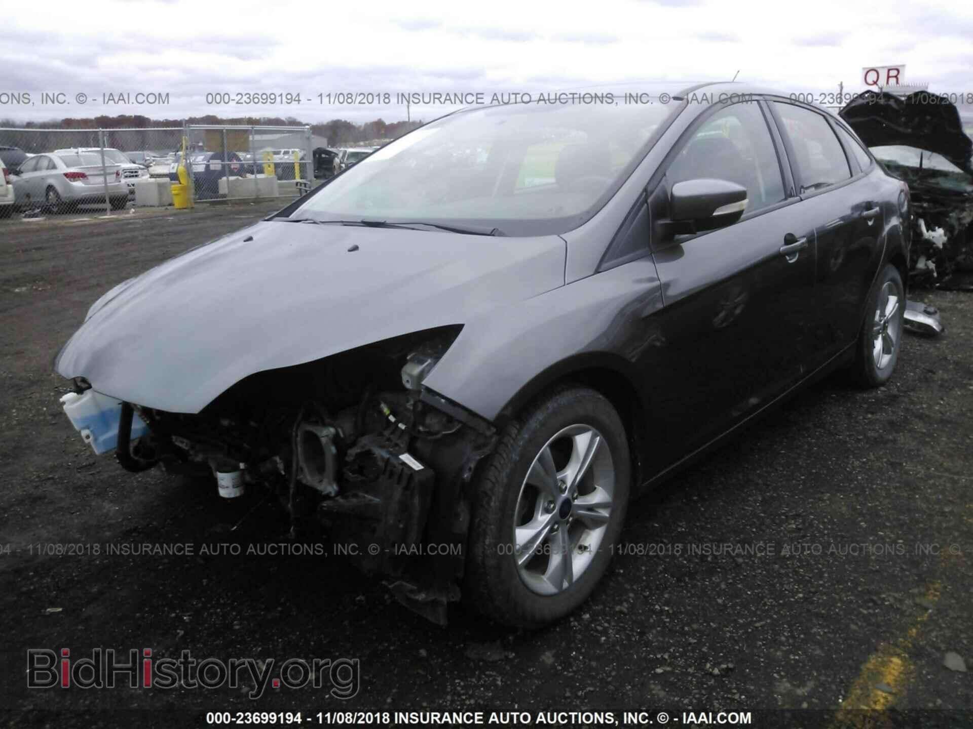 2014 Ford Focus - VIN: 1FADP3F20EL389497 - Photo 2