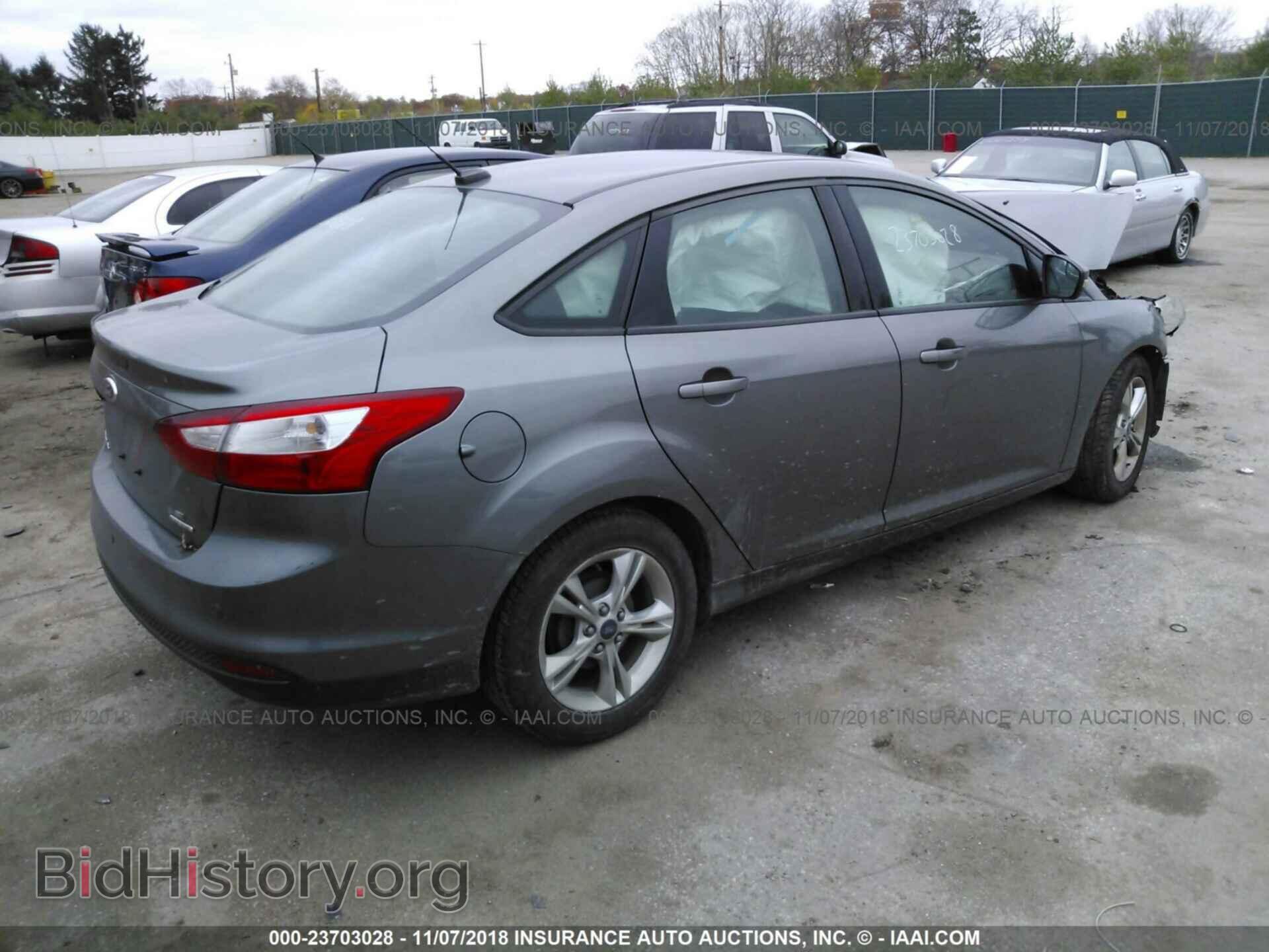2014 FORD FOCUS - VIN: 1FADP3F24EL161101 - Photo 4