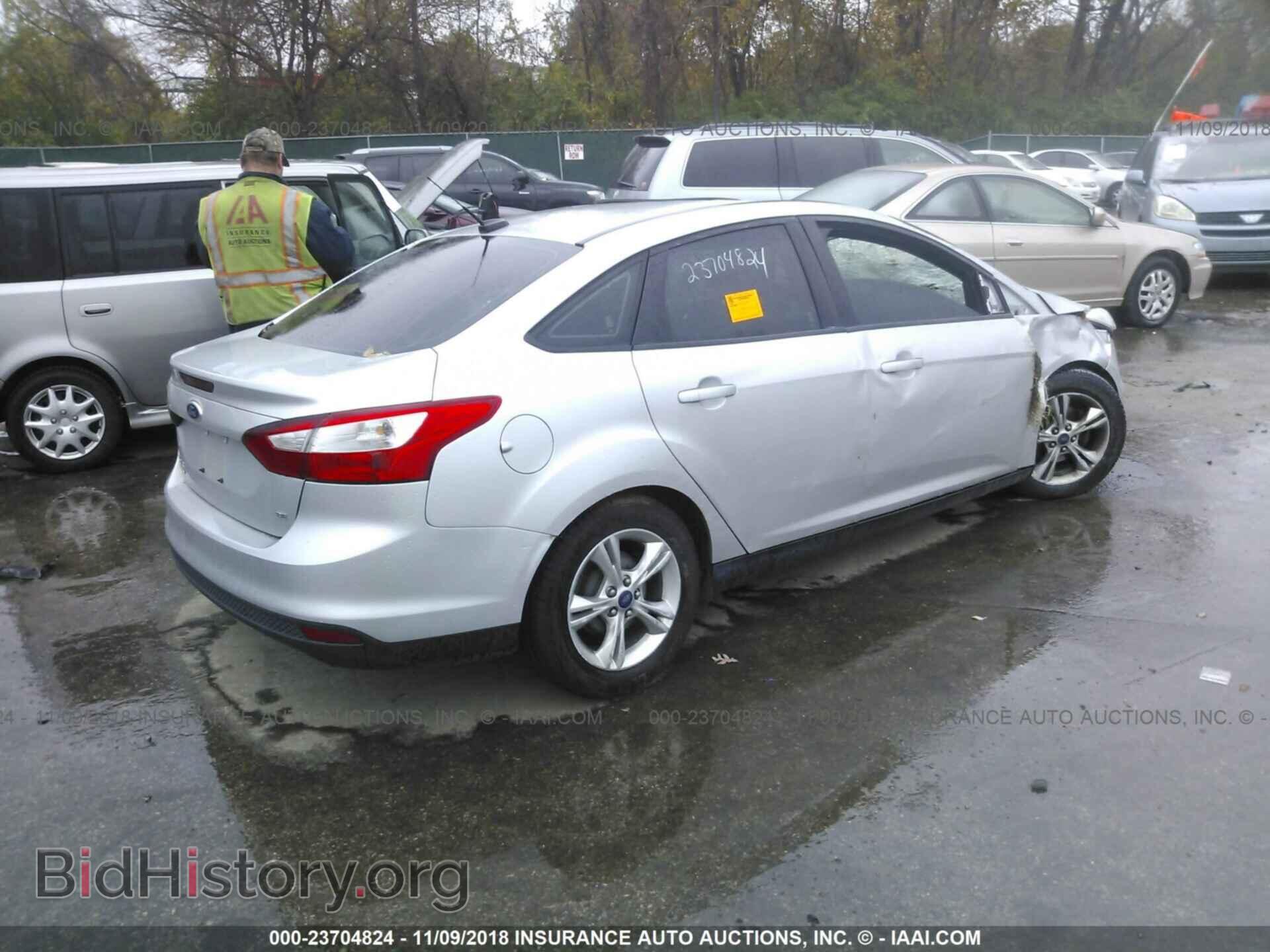 2014 Ford Focus - VIN: 1FADP3F2XEL163130 - Photo 4