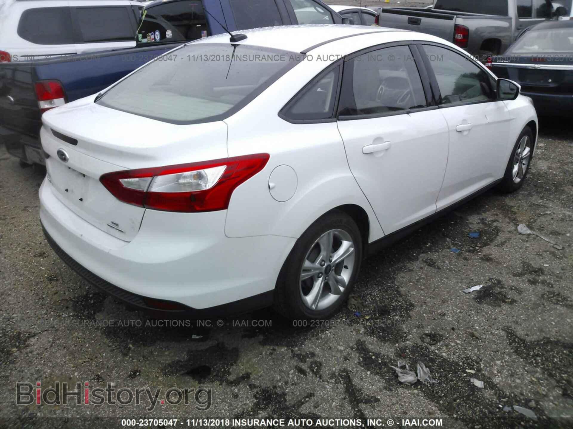 2014 Ford Focus - VIN: 1FADP3F2XEL257816 - Photo 4