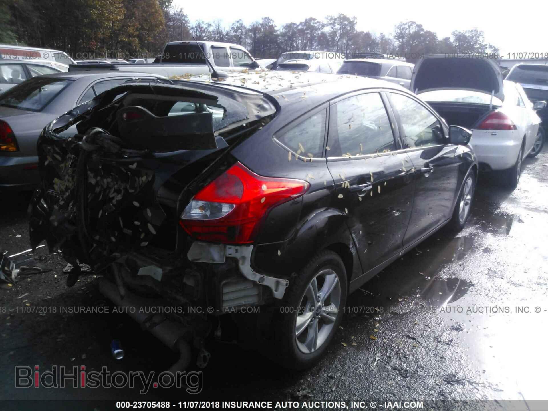 2014 Ford Focus - VIN: 1FADP3K25EL285674 - Photo 4
