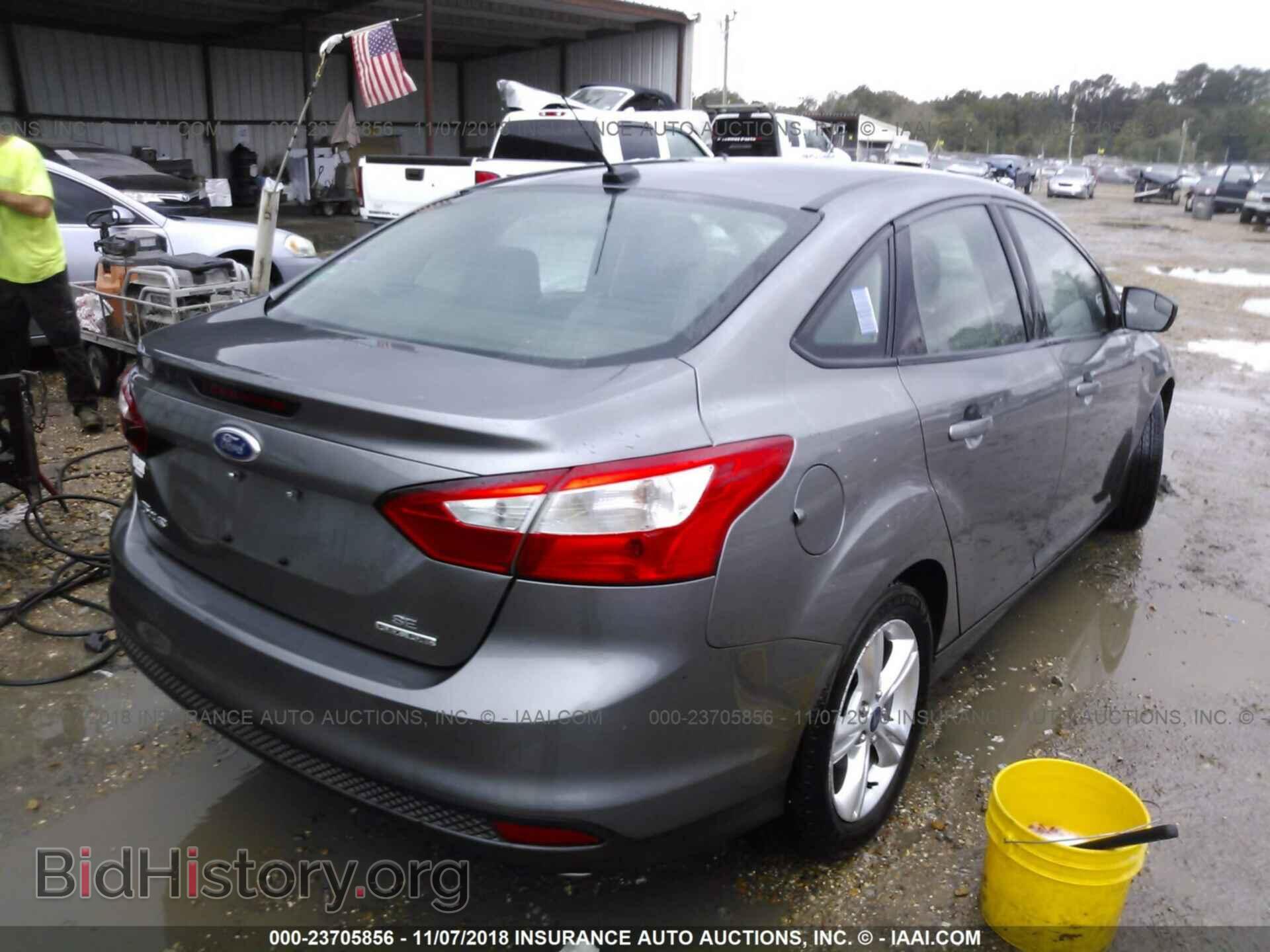 2014 Ford Focus - VIN: 1FADP3F2XEL177433 - Photo 4