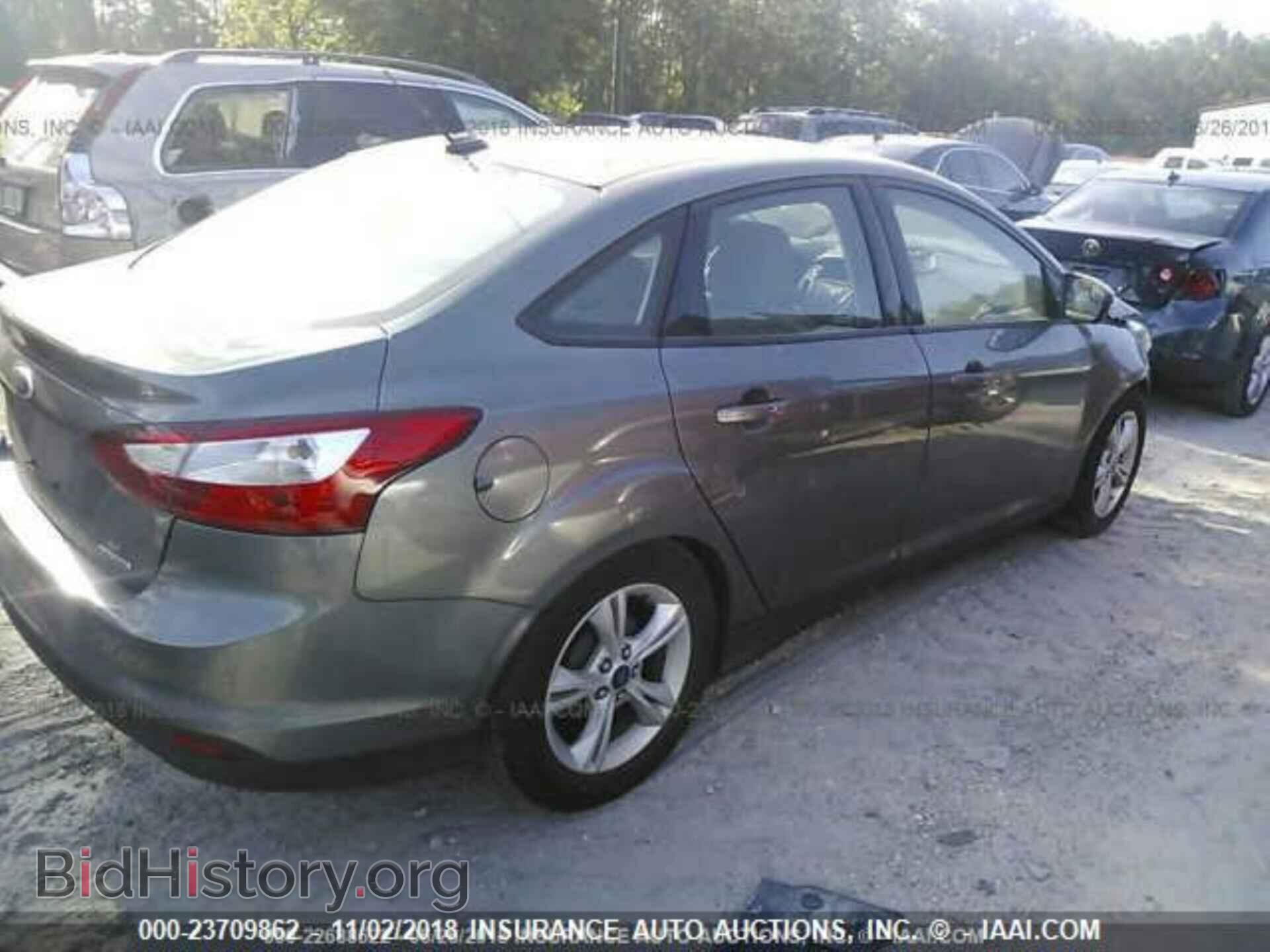 2014 Ford Focus - VIN: 1FADP3F27EL436735 - Photo 4