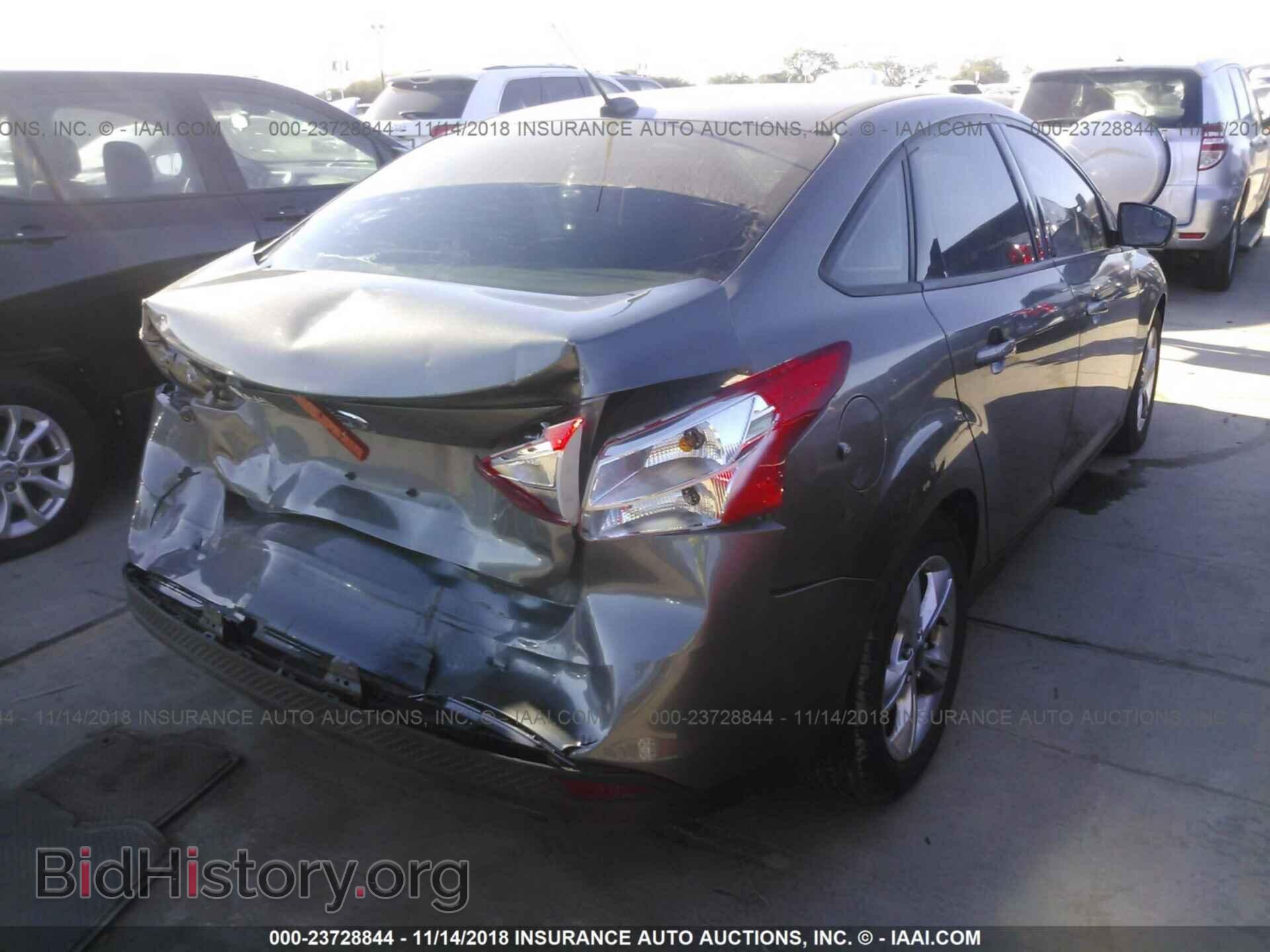 2014 Ford Focus - VIN: 1FADP3F27EL330141 - Photo 4