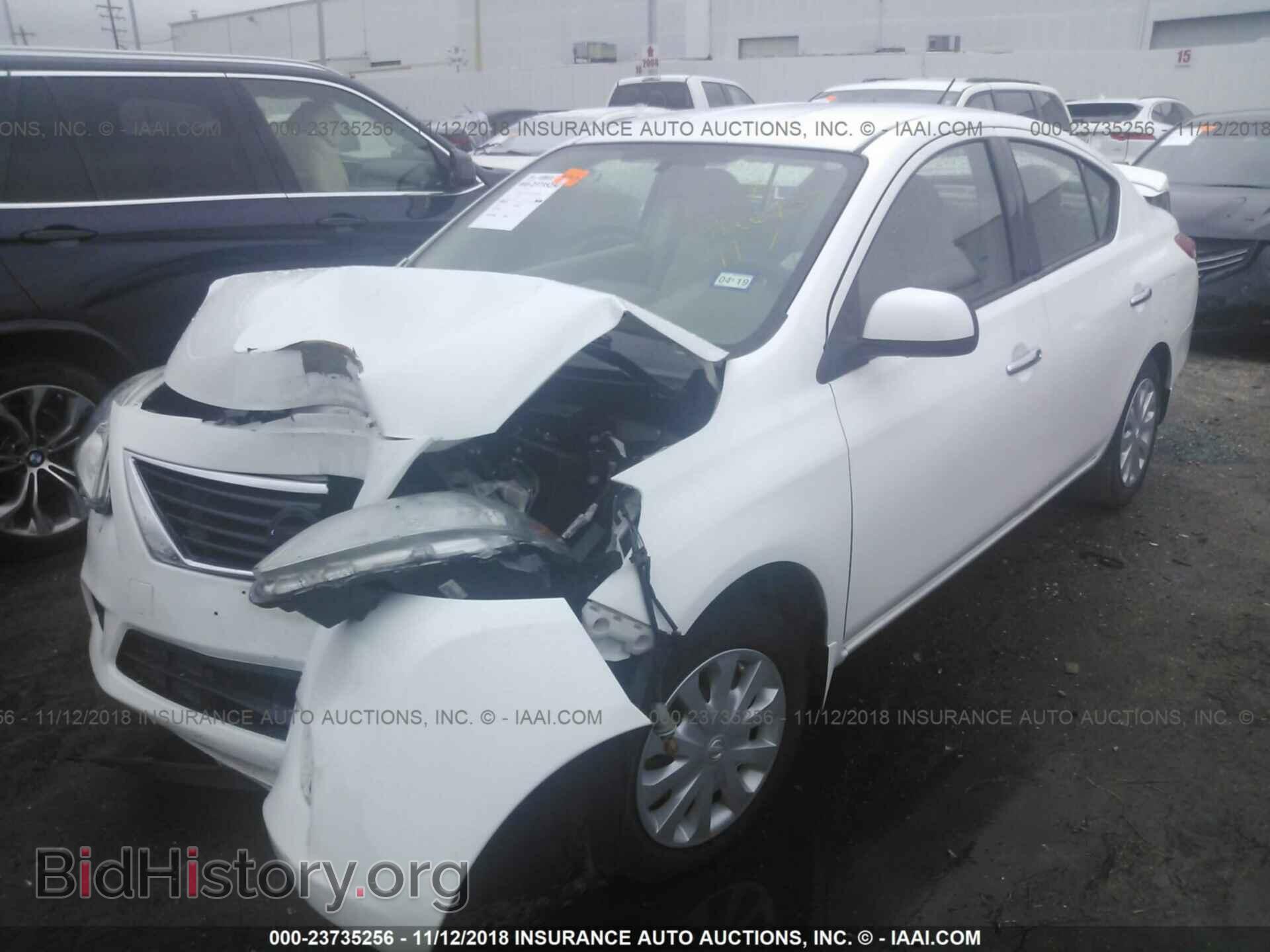 2014 Nissan Versa - VIN: 3N1CN7AP4EL841044 - Фото 2