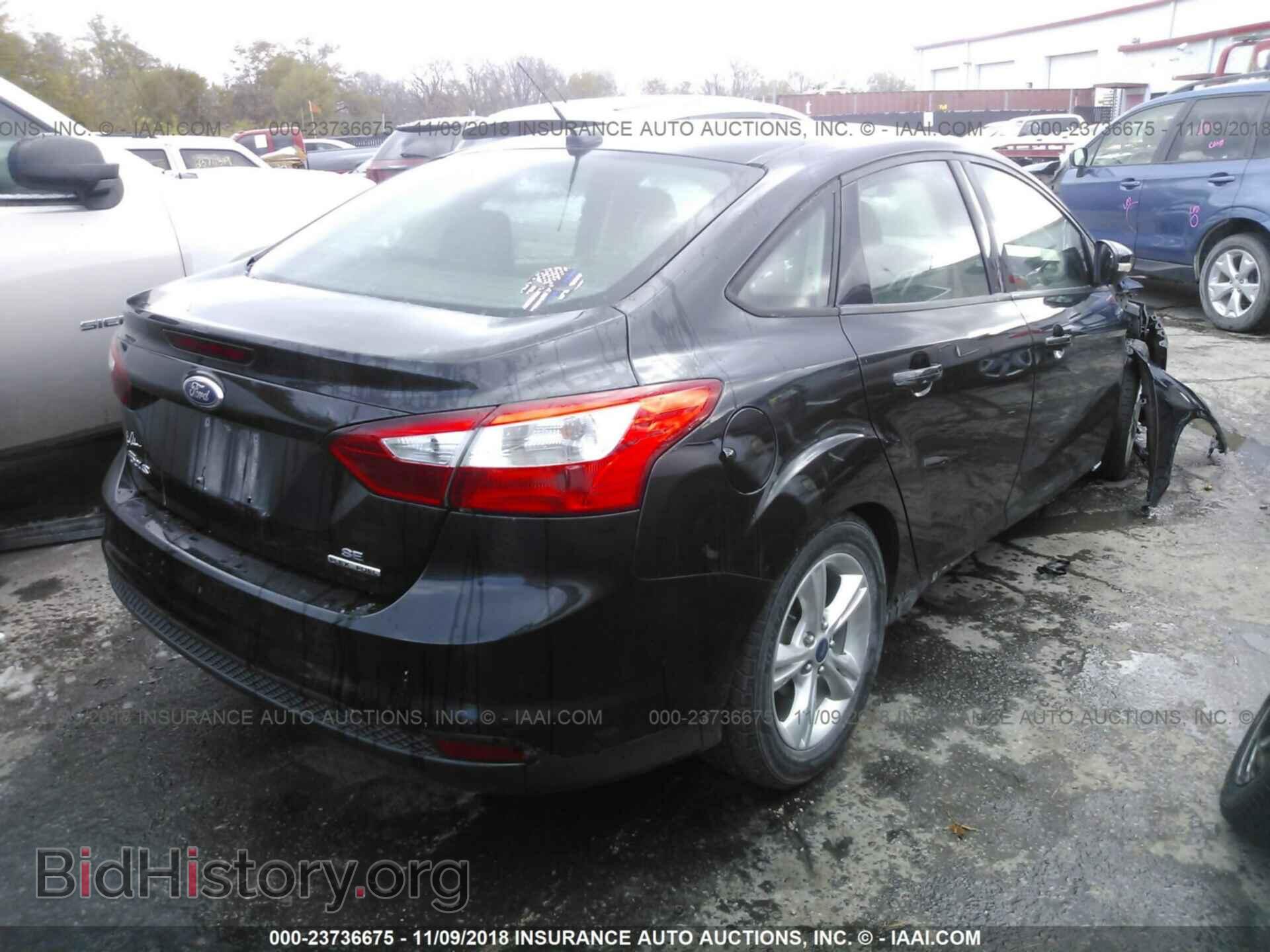 2014 FORD FOCUS - VIN: 1FADP3F2XEL166559 - Photo 4