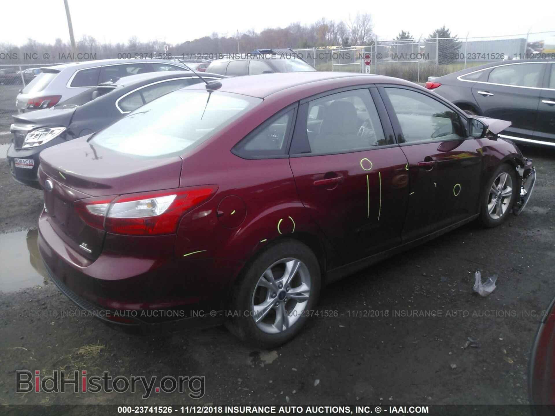 2014 Ford Focus - VIN: 1FADP3F2XEL370620 - Photo 4