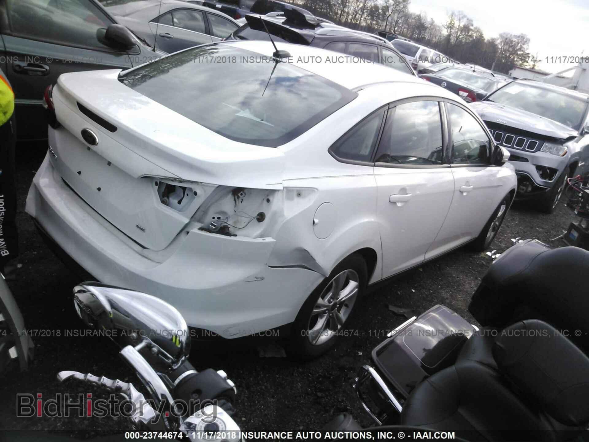 2014 FORD FOCUS - VIN: 1FADP3F27EL193234 - Photo 4